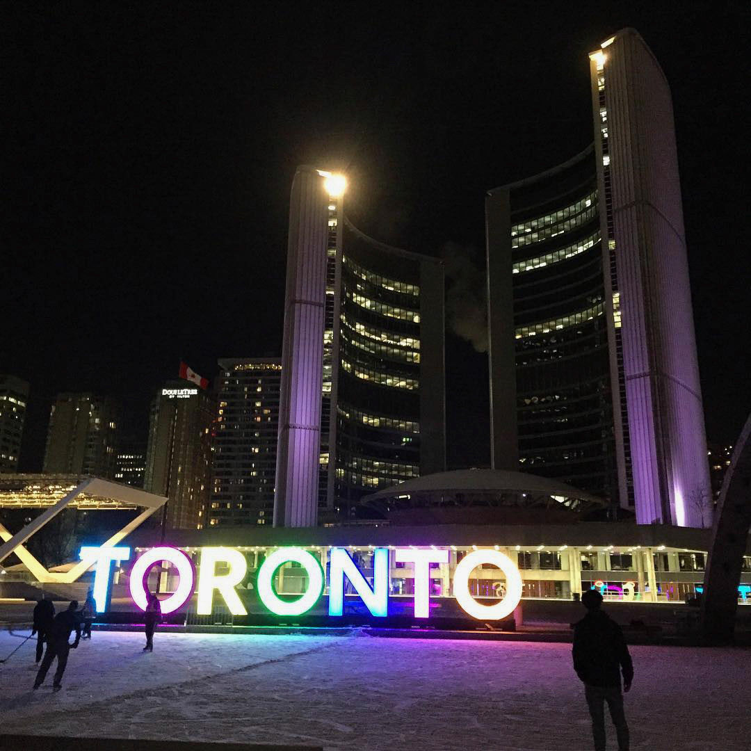 One of Toronto's most famous landmarks: City Hall and Nathan Phillips square. Love that they kept the Toronto sign from the Pan Am Games.