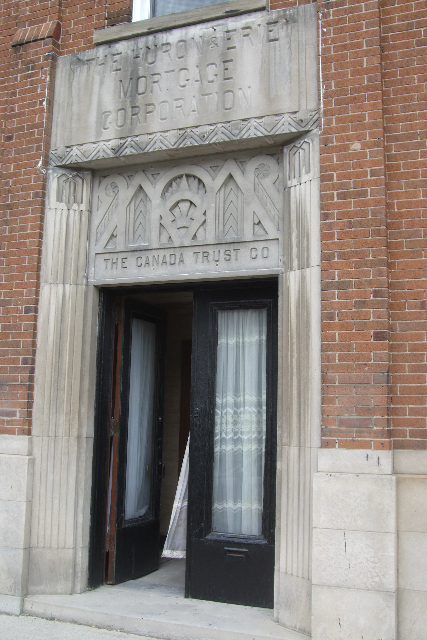 A really neat architectural find... an old Canada Trust branch entrance is now an apartment