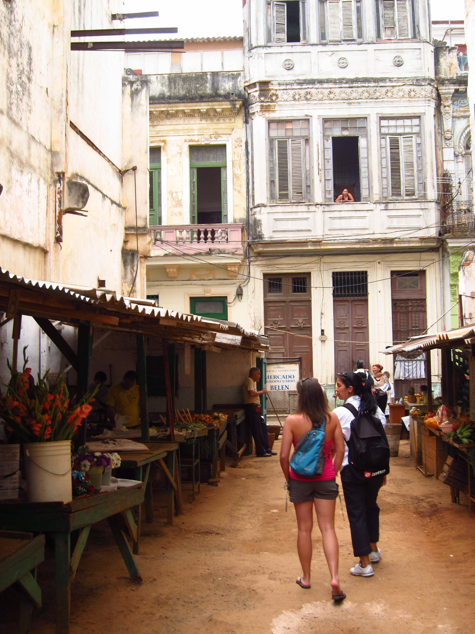 Our awesome tour guide leads Kelly and I through the market in Havana