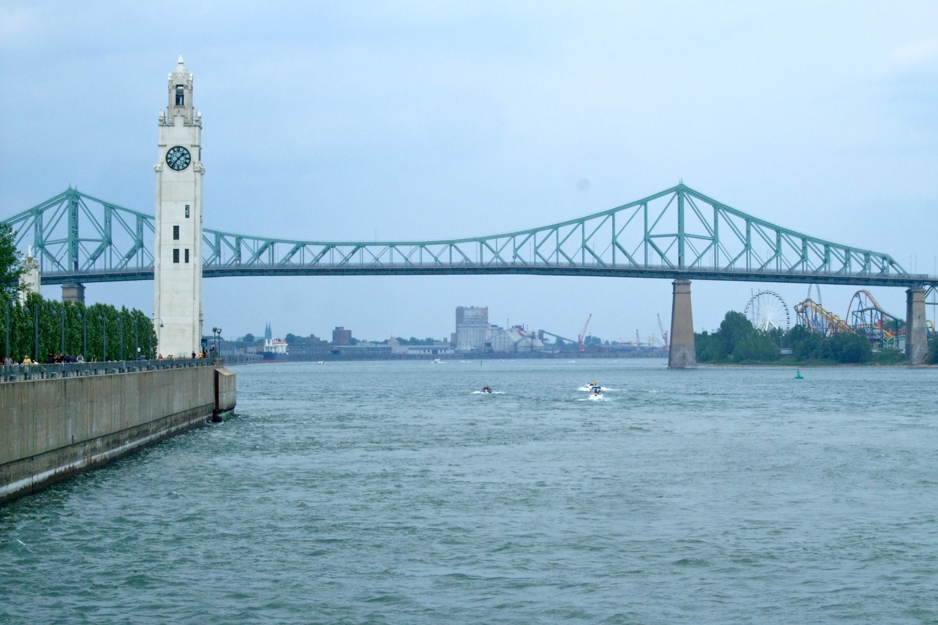 La Ronde amusement park on the right under Jacques Cartier Bridge. neat tower on the left