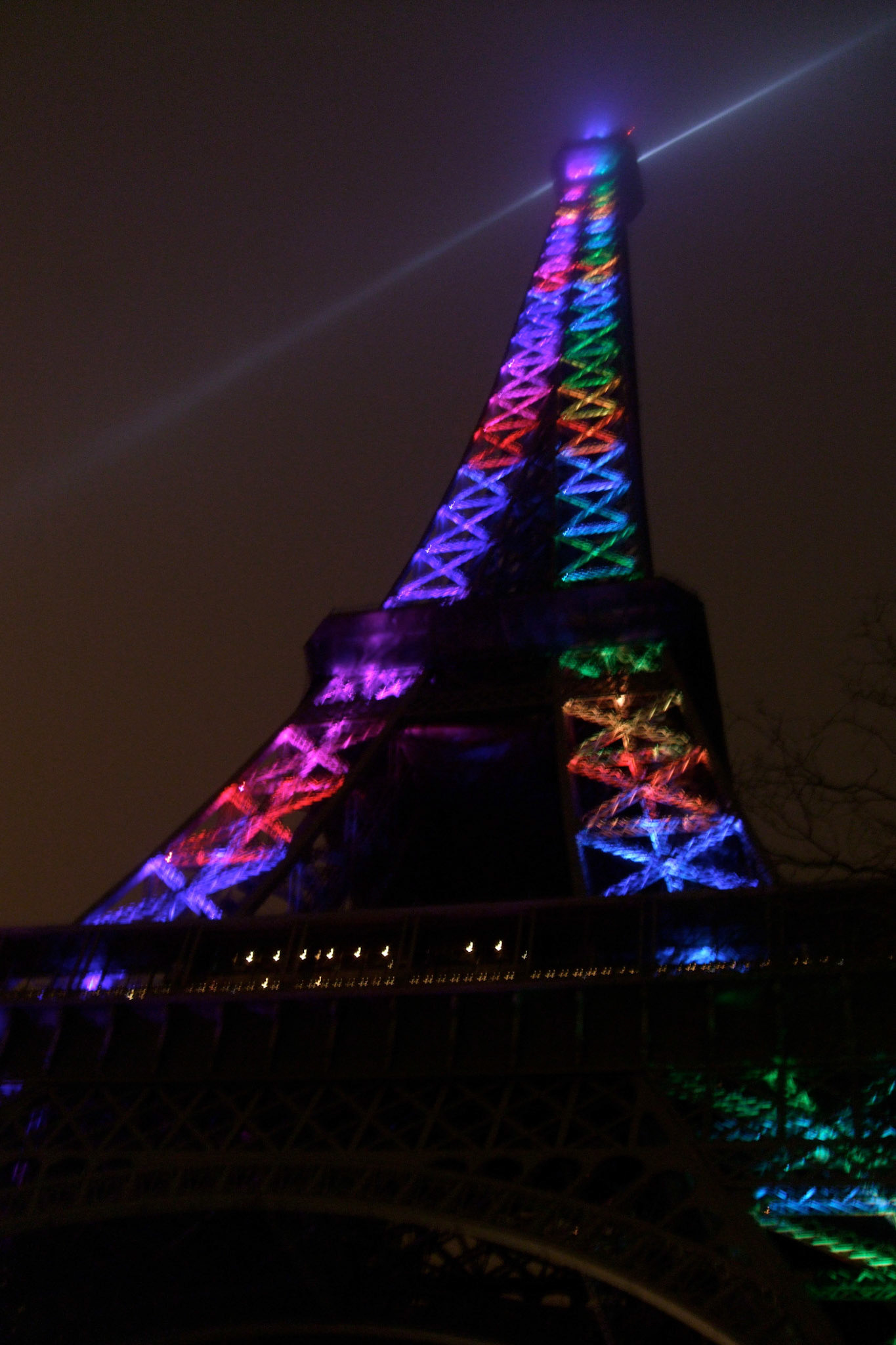 Ringing in 2010 at the Eiffel Tower. A little blurry; but wanted to show the colours the lights created