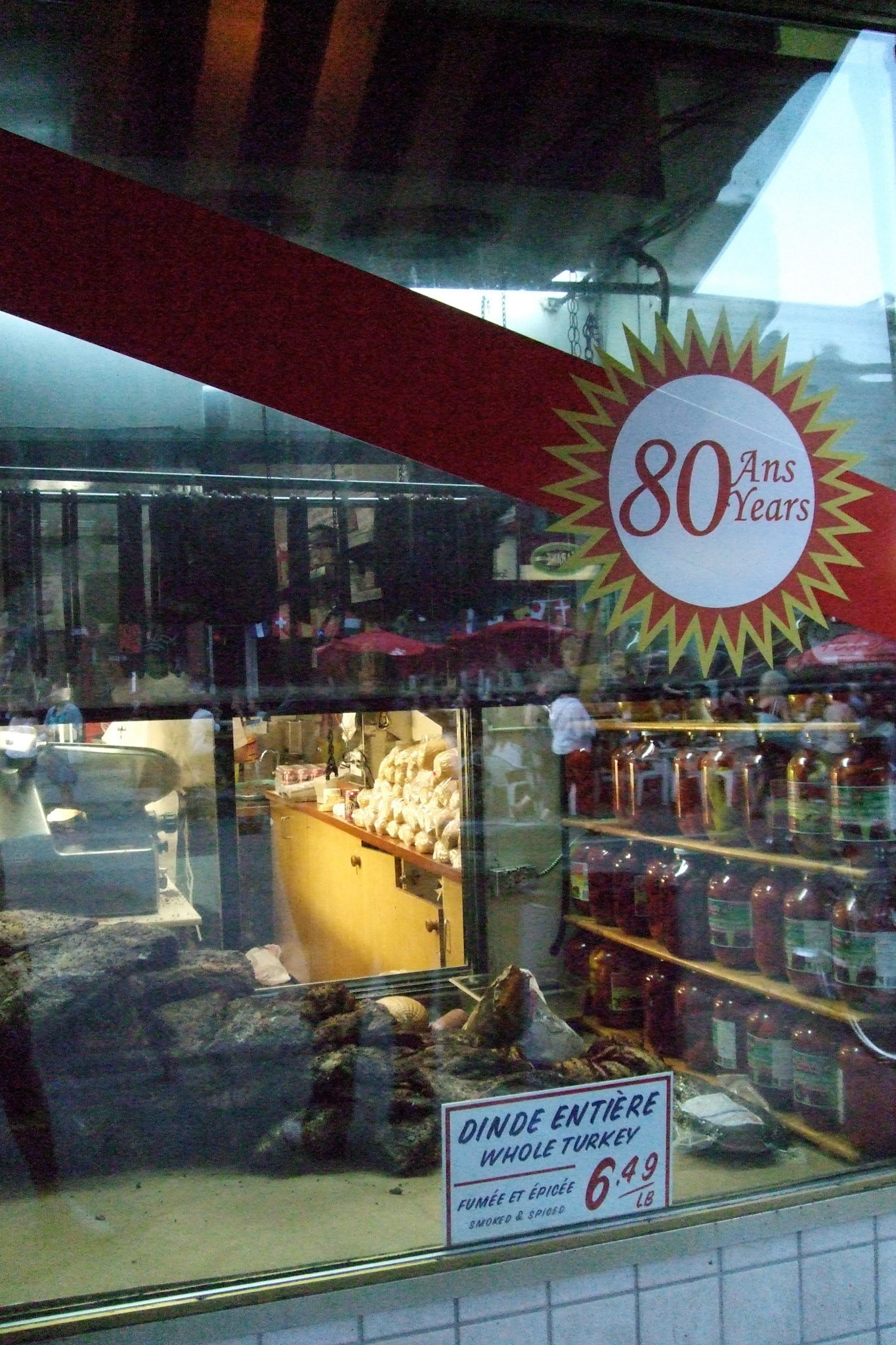 Montreal smoked meat curing in the front window of Schwartz