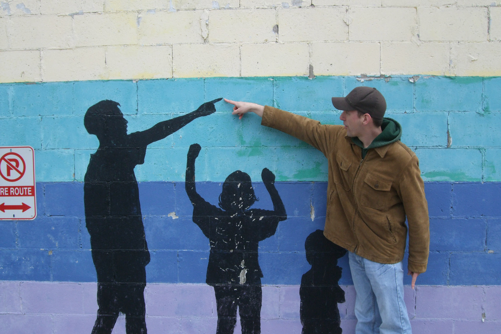 Playing with a mural at the end of our photo walk