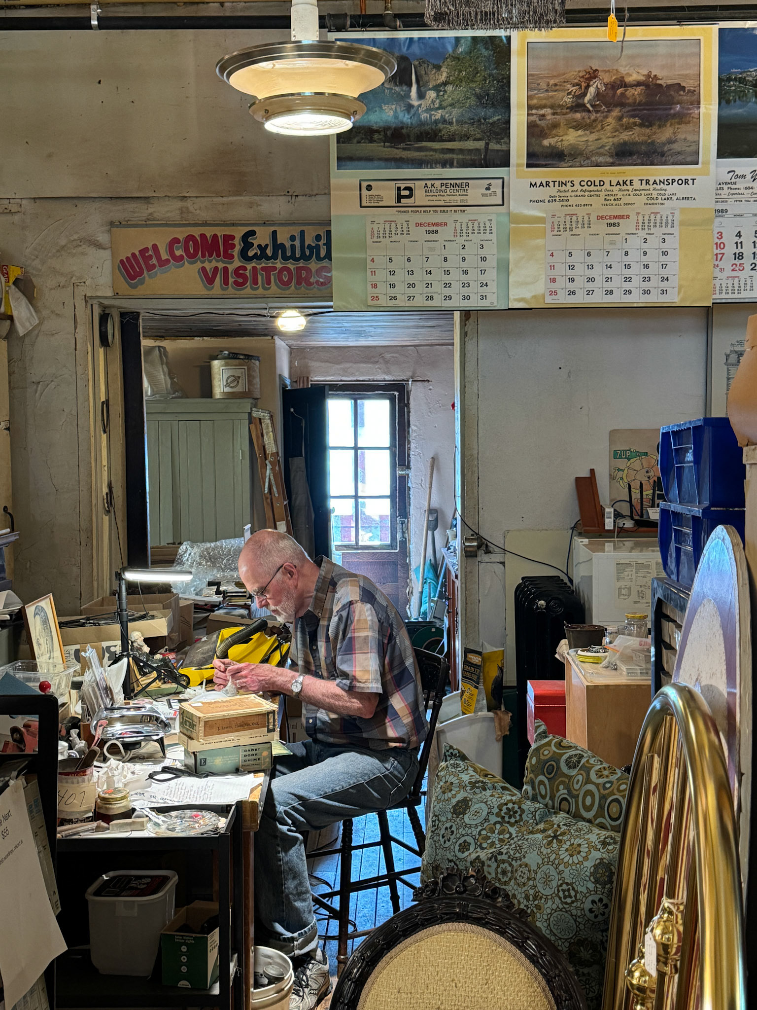 Laurence working his craft at the antique store