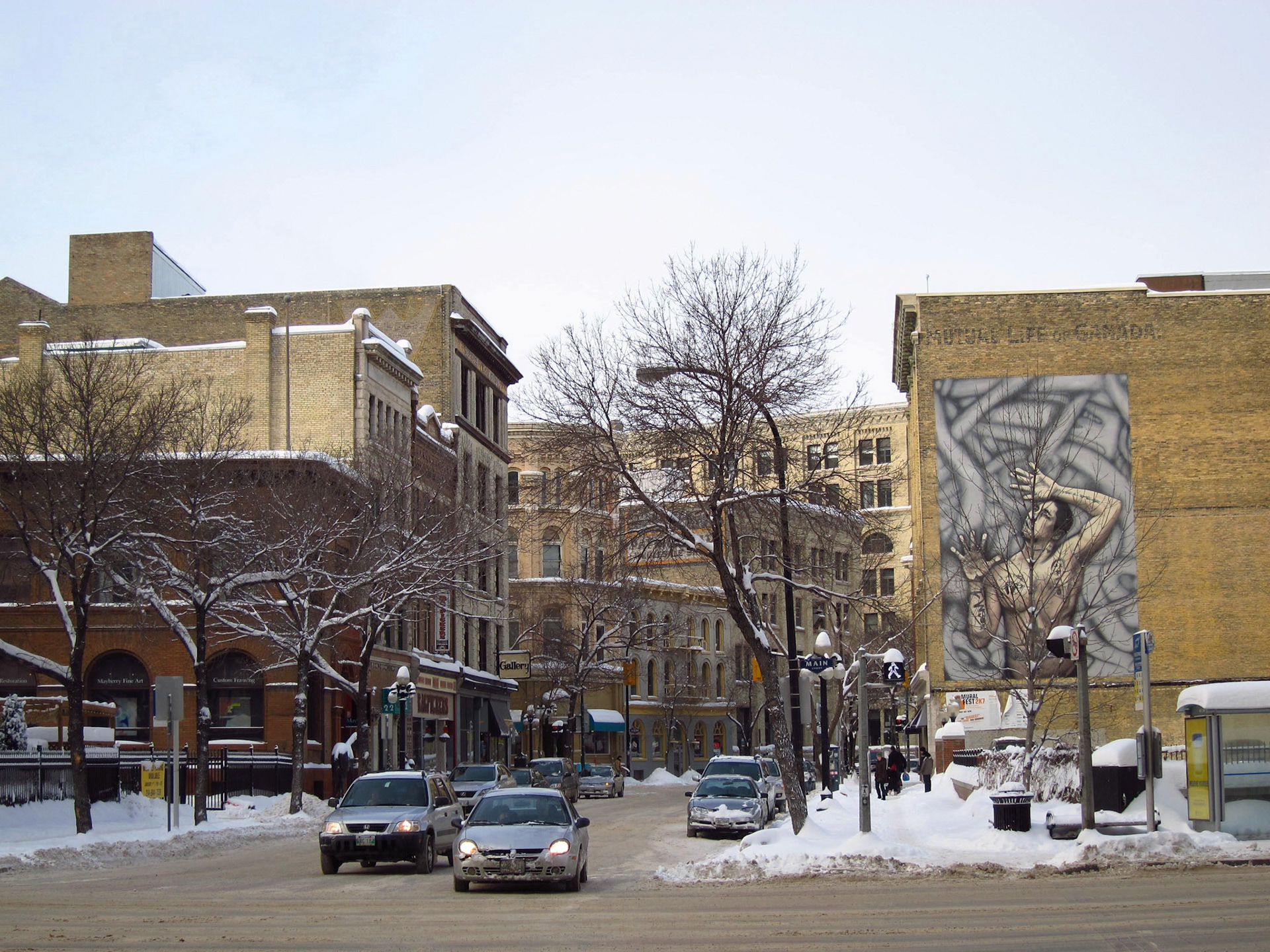 The Exhange District today is home to art, restaurants, boutiques and neat murals like this one