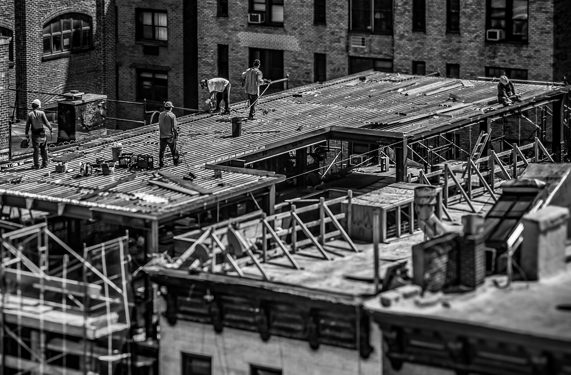 Men On Roof Working