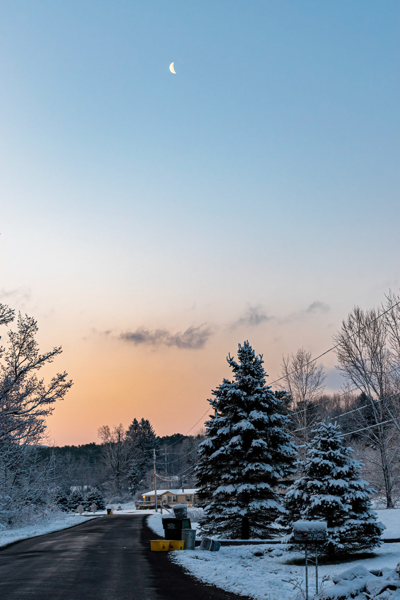 Cresent Moon over Seward Road on Snowy Morning