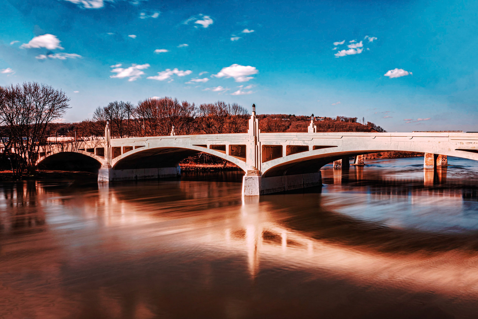 Sunset Lights up Bridge and Water in Binghamton