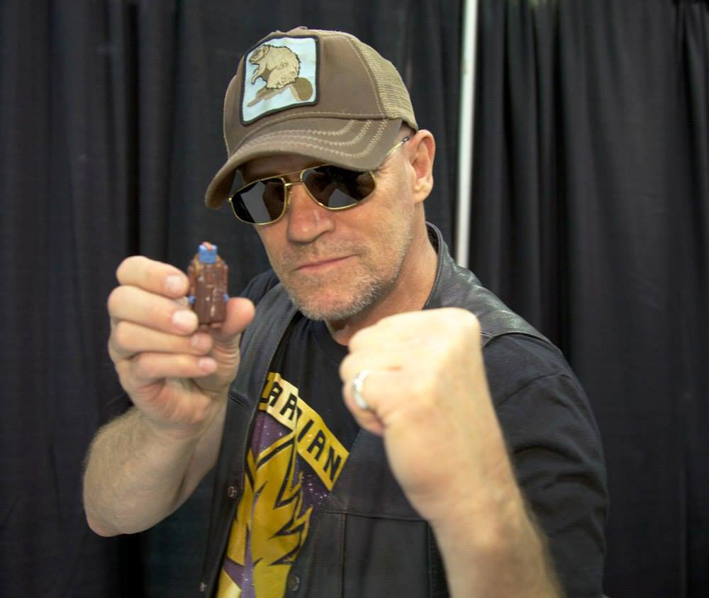 Michael Rooker with his Marvel's Guardians of the Galaxy Yondu Minimate