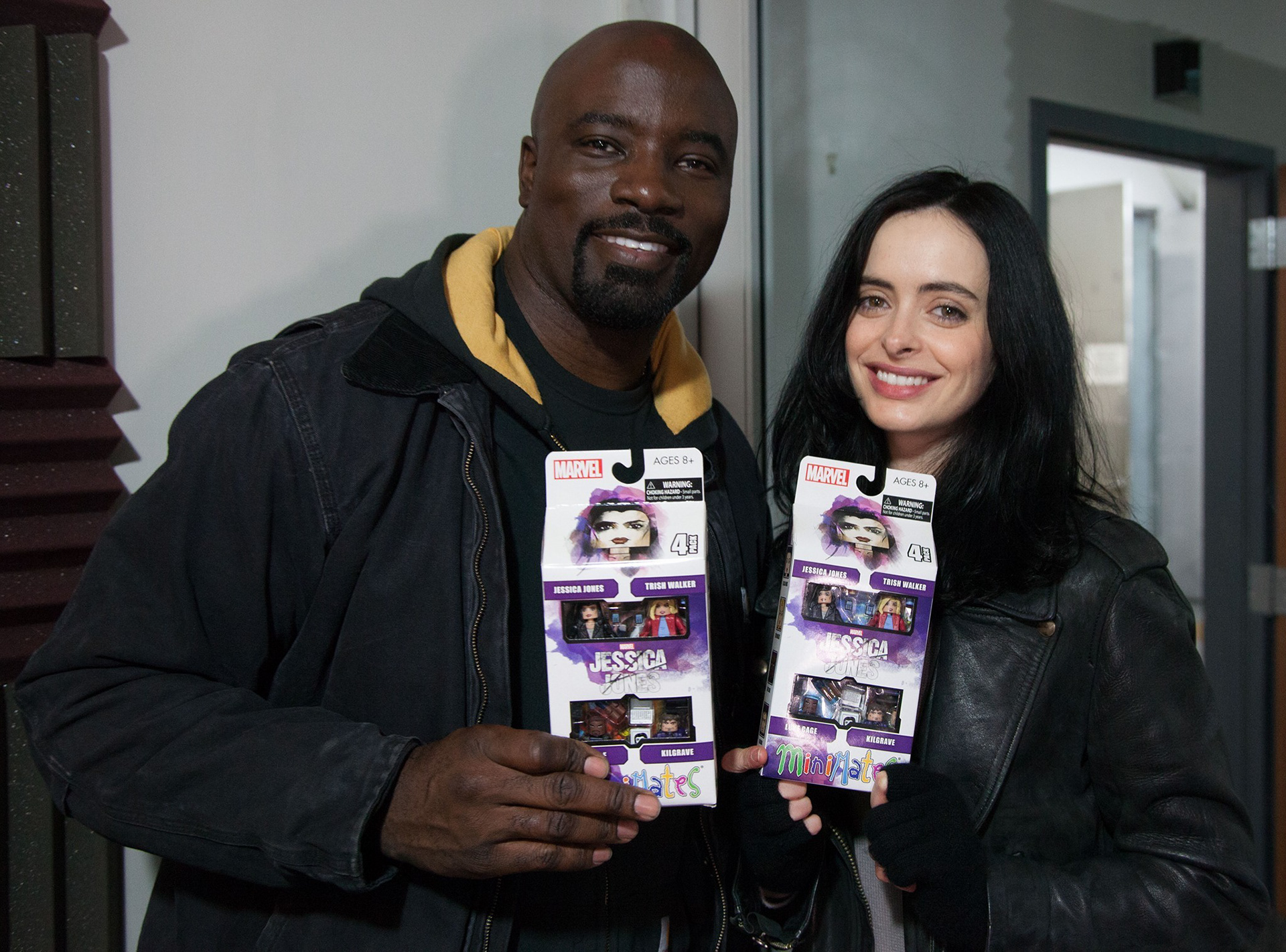 Mike Colter and Krysten Ritter with their Marvel's Jessica Jones Minimates