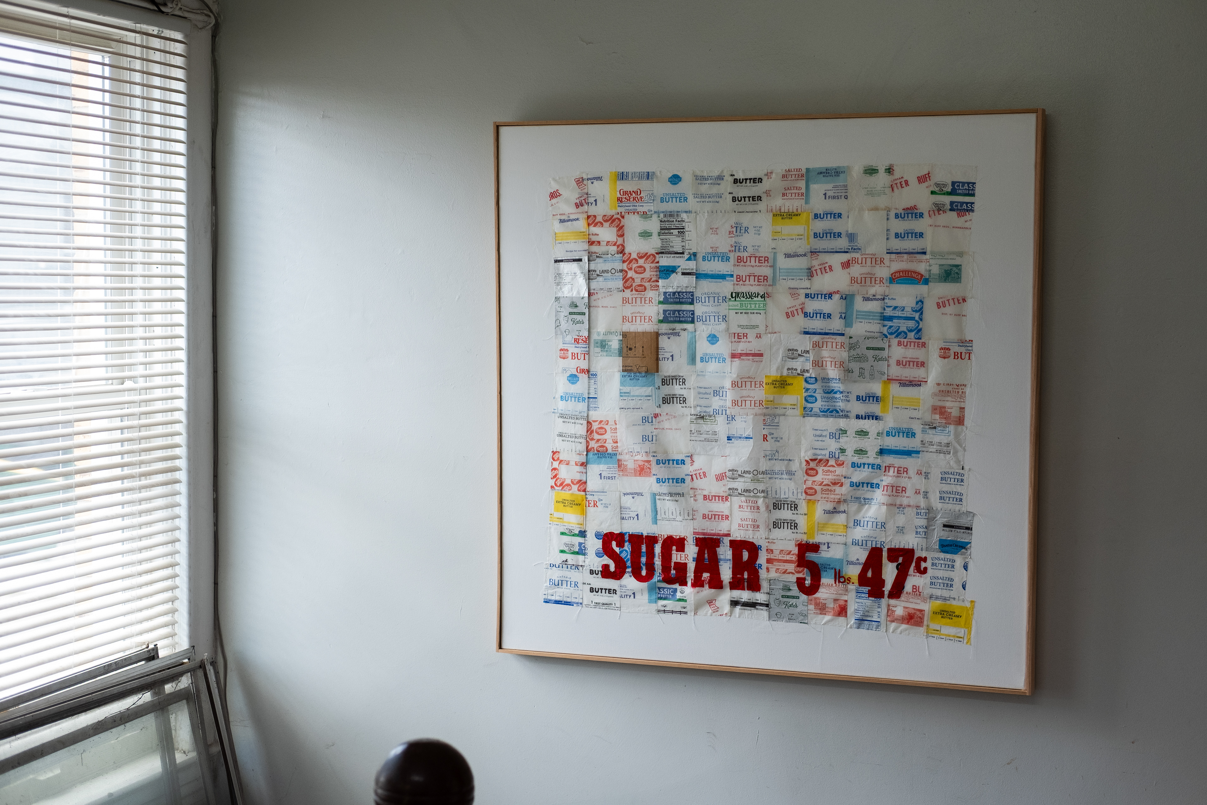 Machine-sewn butter wrappers, enamel paint, on canvas, 2026
