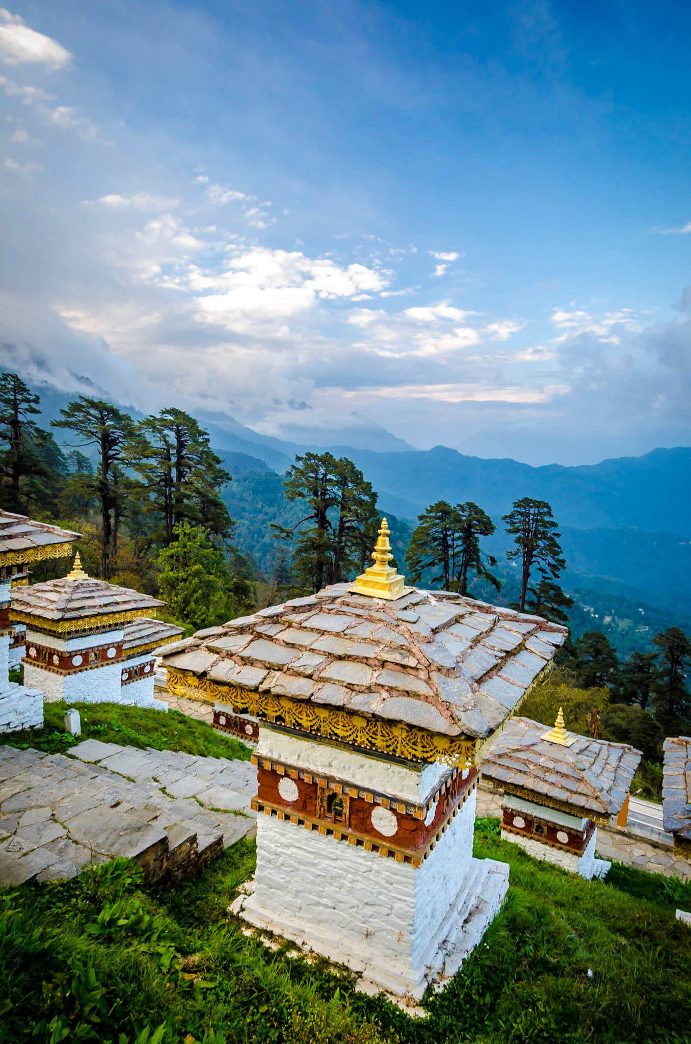 The Dochula Pass is a mountain pass in the snow covered Himalayas within Bhutan on the road from Thimpu to Punakha where 108 memorial chortens or stupas known as "Druk Wangyal Chortens" have been built by Ashi Dorji Wangmo Wangchuk, the eldest Queen Mother