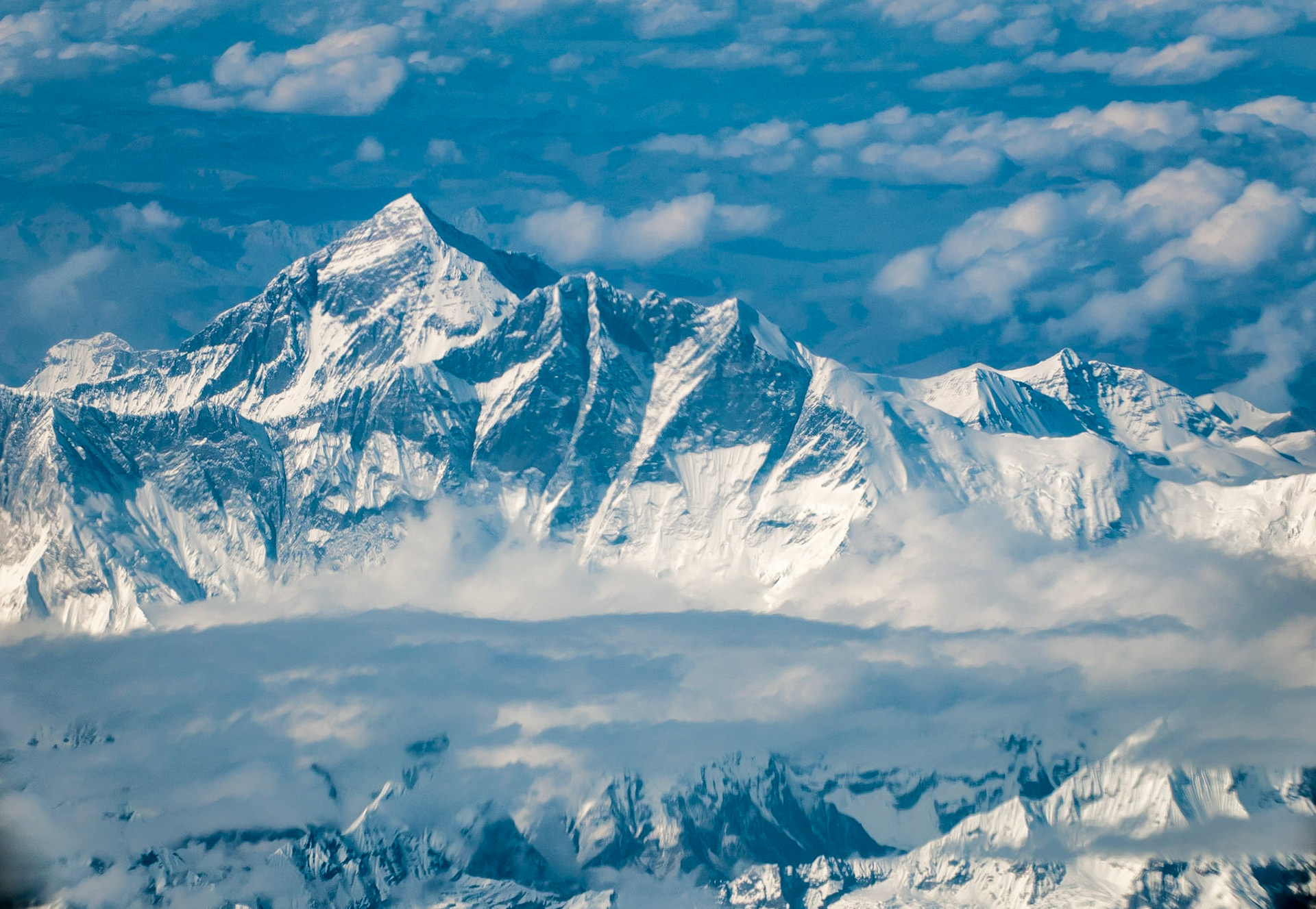 Arial shot of Mt. Everest seen from DrukAir flight Delhi (India) to Paro (Bhutan). Mt. Everest is also known in Nepal as Sagarmāthā and in Tibet as Chomolungma, is Earth's highest mountain.