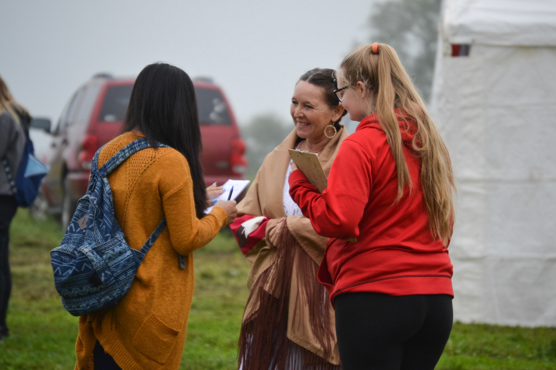 Debra Short talks to a couple of students on Friday.
