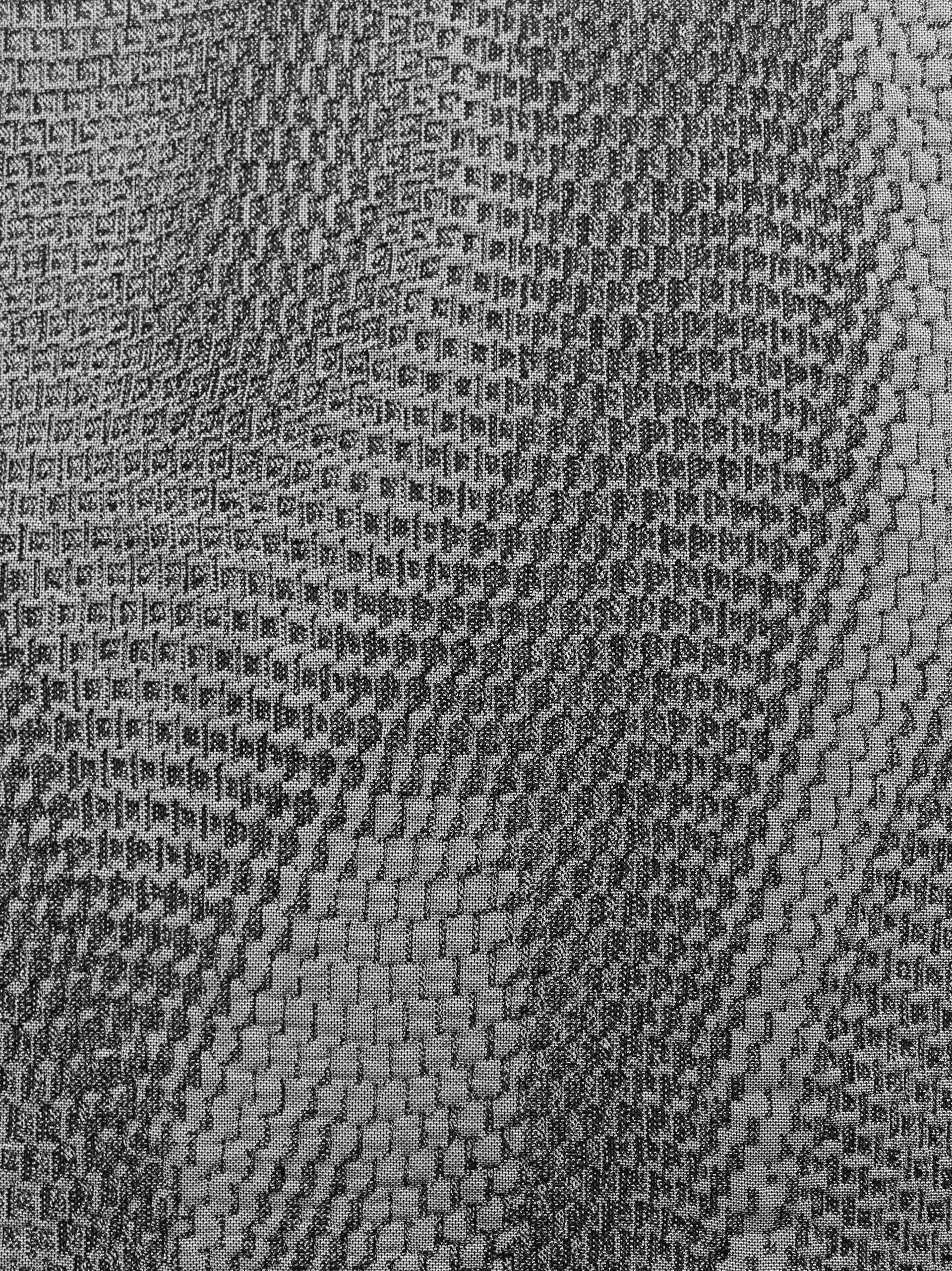 Close-up "3D Grid Surface” Filled Double Jersey