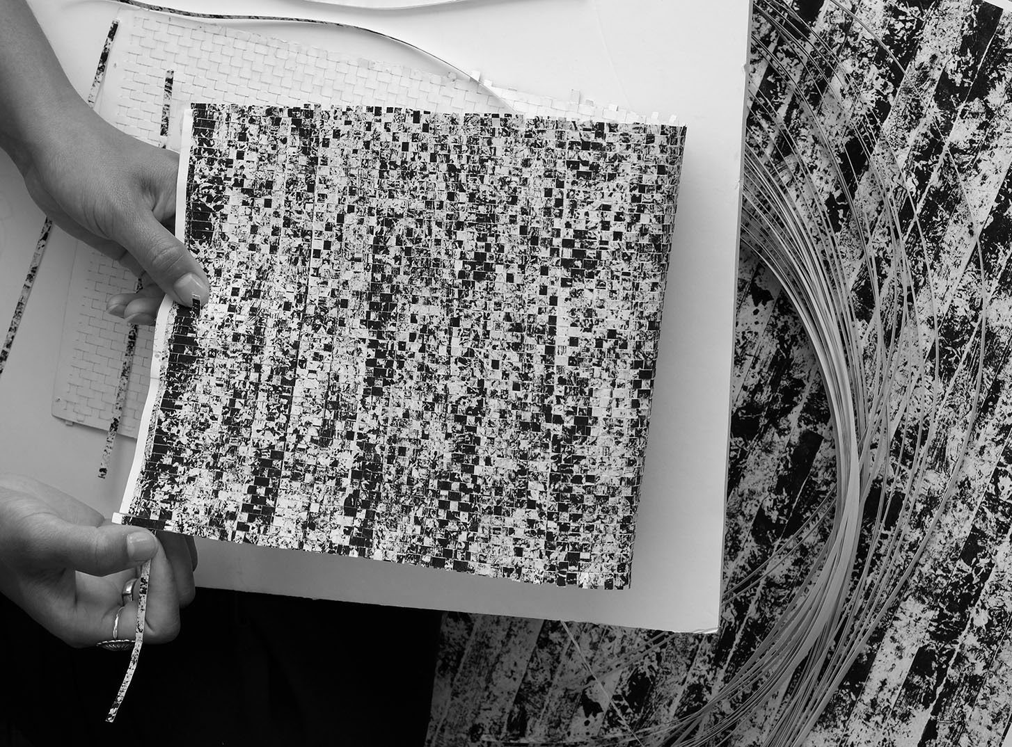 weaving: Handwoven design made of print artwork laser-cut into paper strips