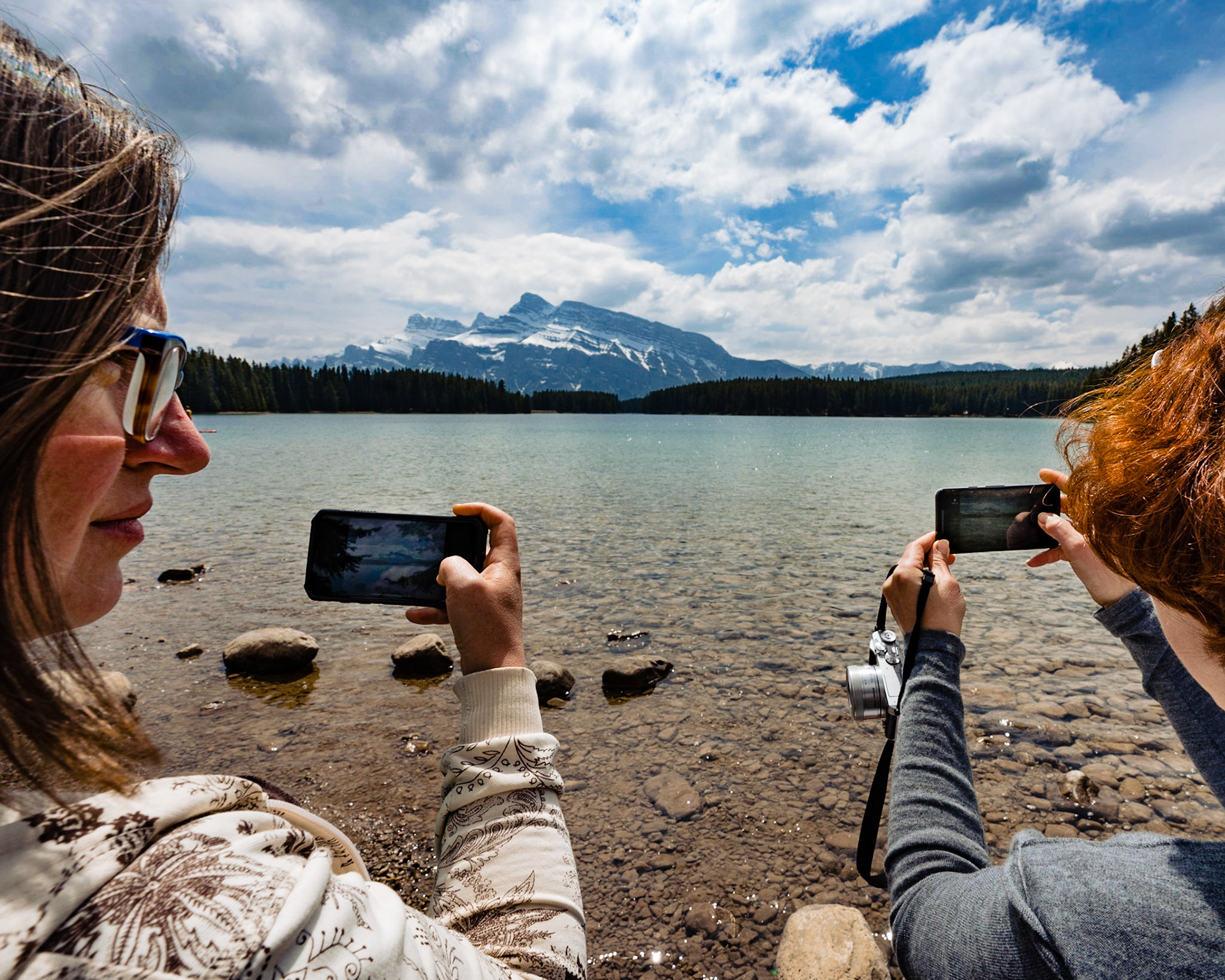 Photographing lake and mountains at Two Jack Lake