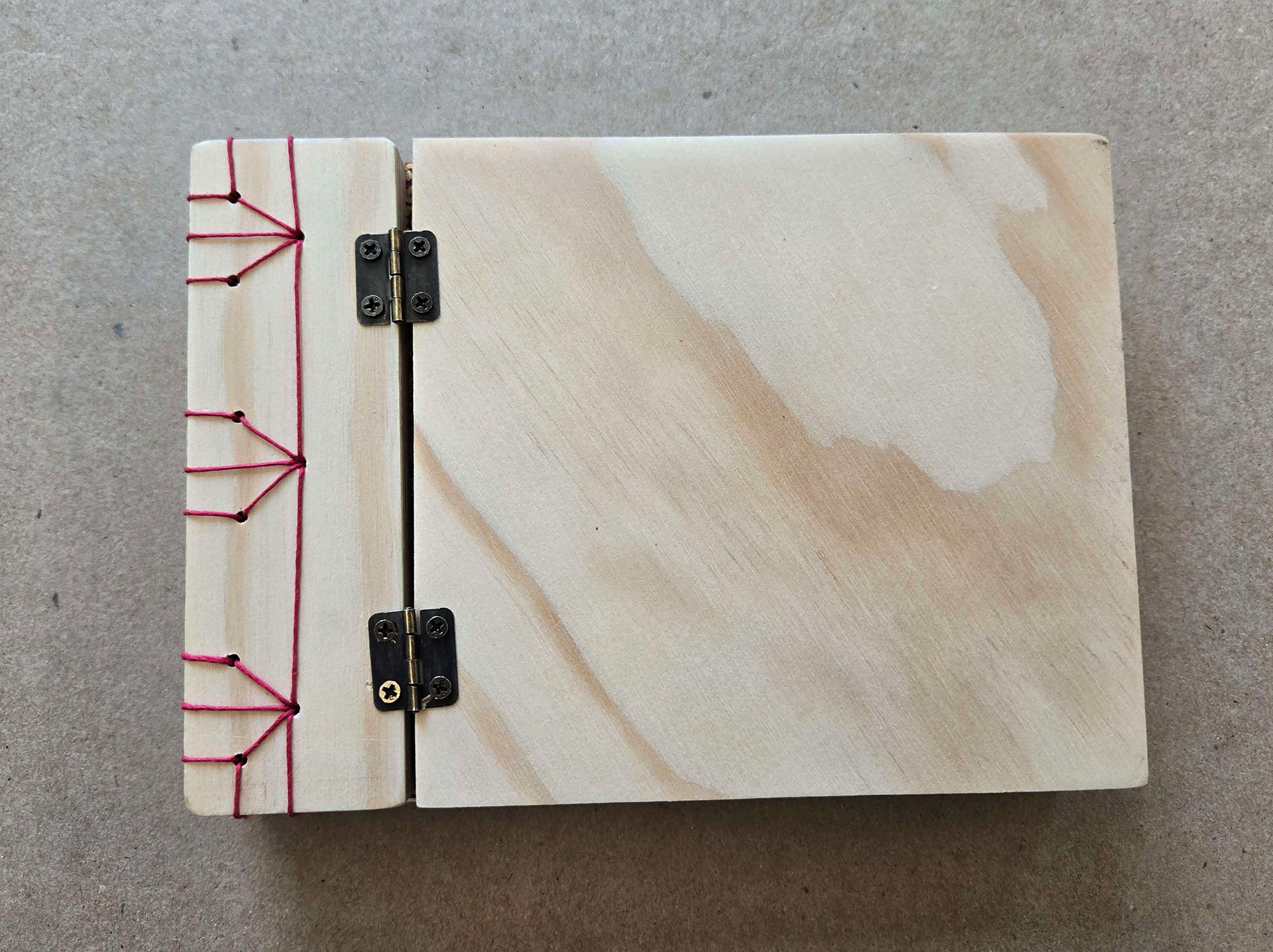 cover, stitching, and hardware