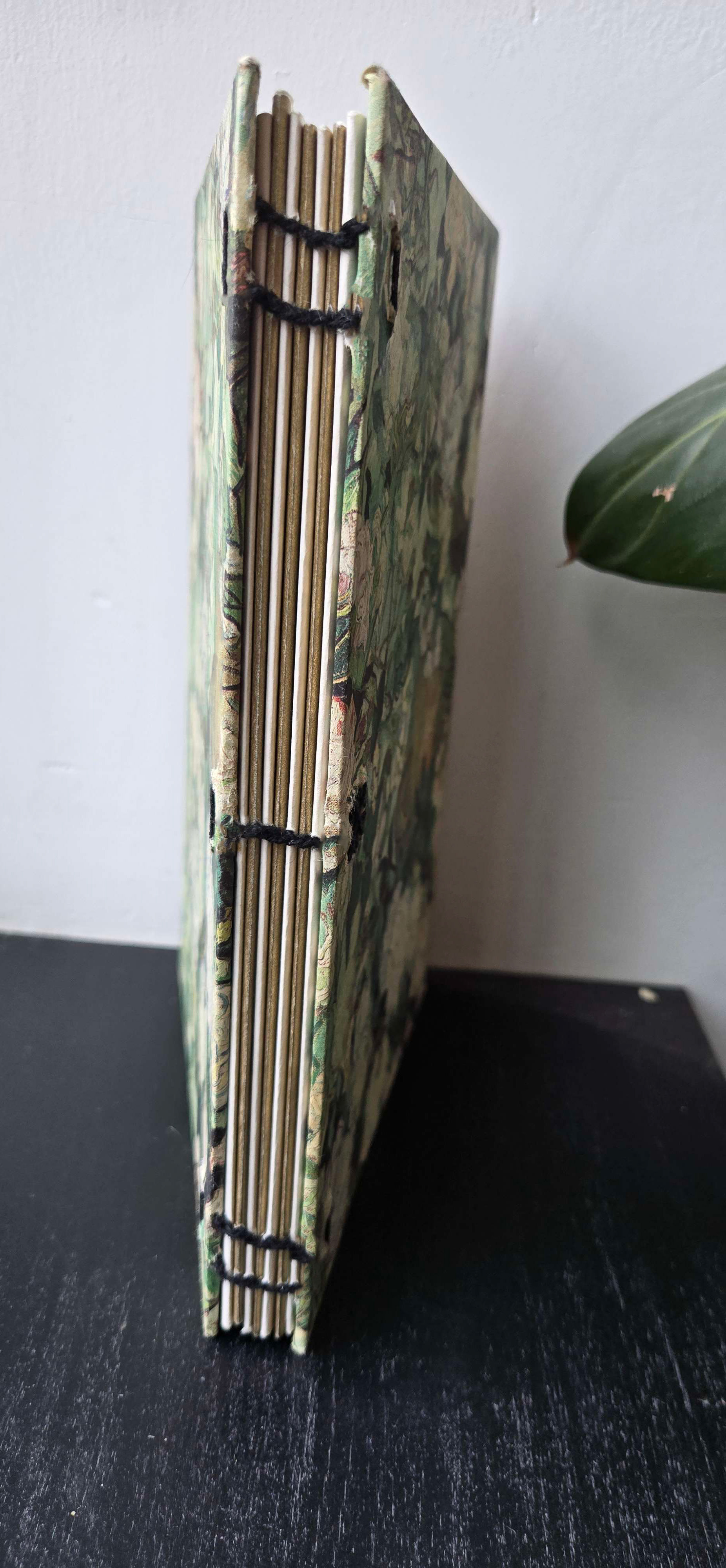 coptic spine with gold signature wrappers