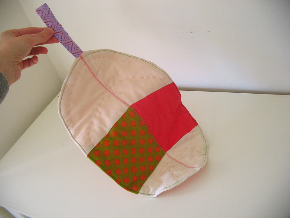 A large sewn and curving leaf