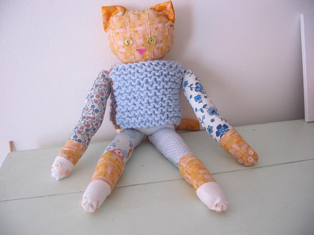 Sewn Hank the Cat, modeled after my orange tabby cat at the time, Pinky Leon