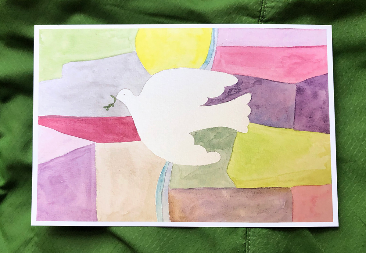 Illustrated white dove flying over a watercolor patchwork landscape