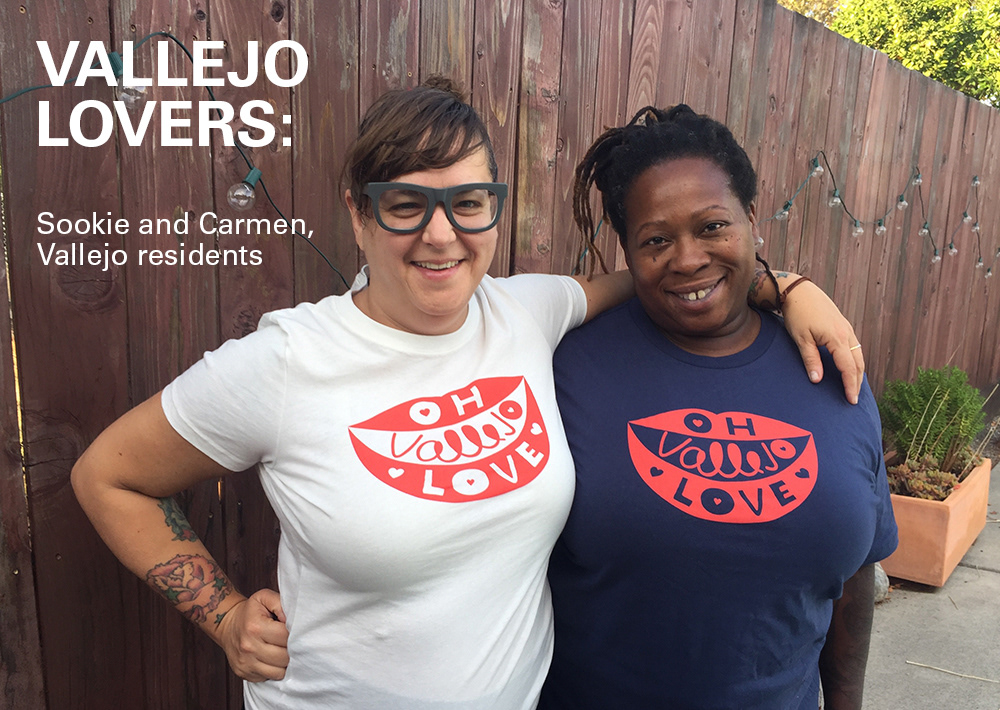 Vallejo friends wearing two different color of Oh Vallejo Love tees and smiling.