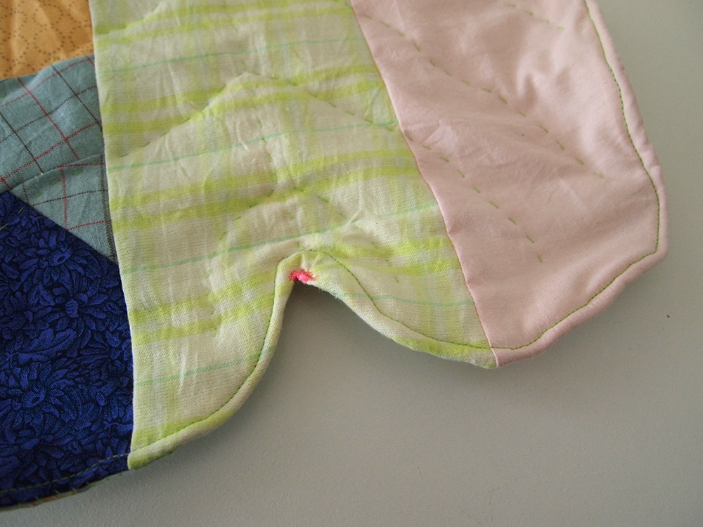 Closeup of the sewing of a leaf