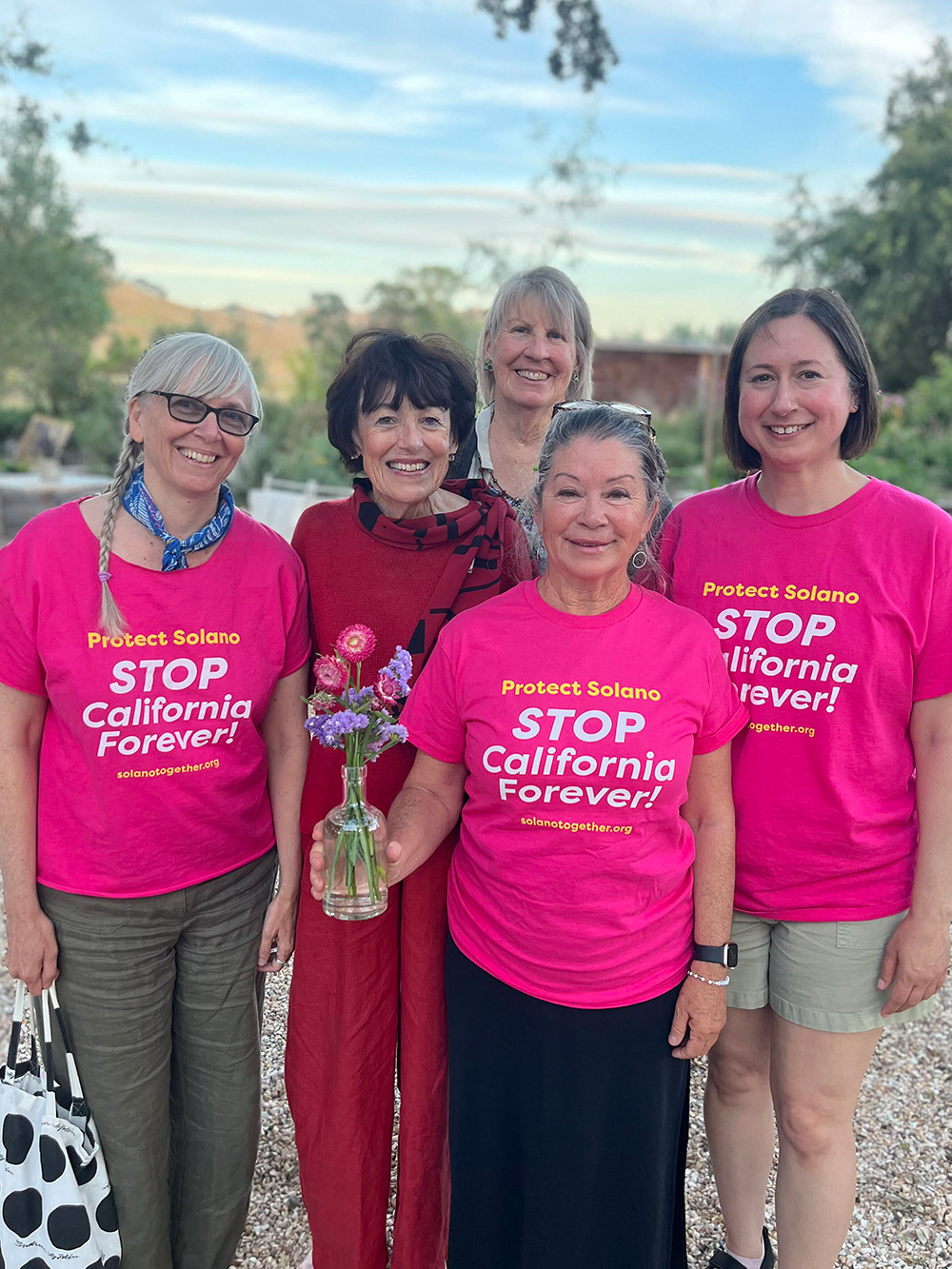 Solano Together coalition members wearing our tees.
