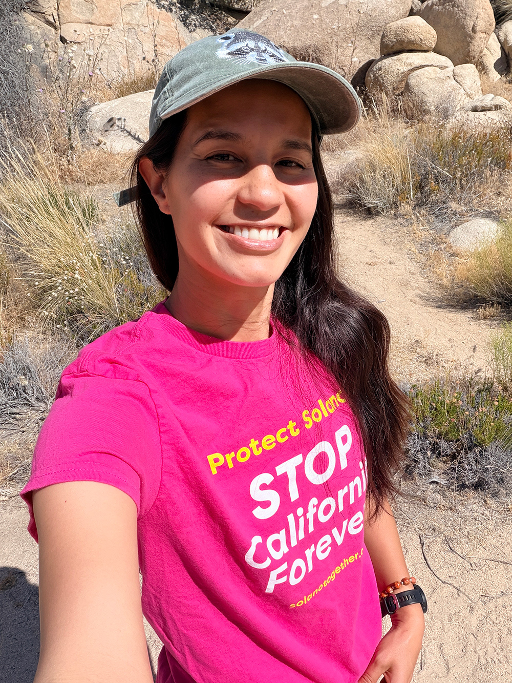 Erin McGarry modeling the tee with her salamander illustration on the back.