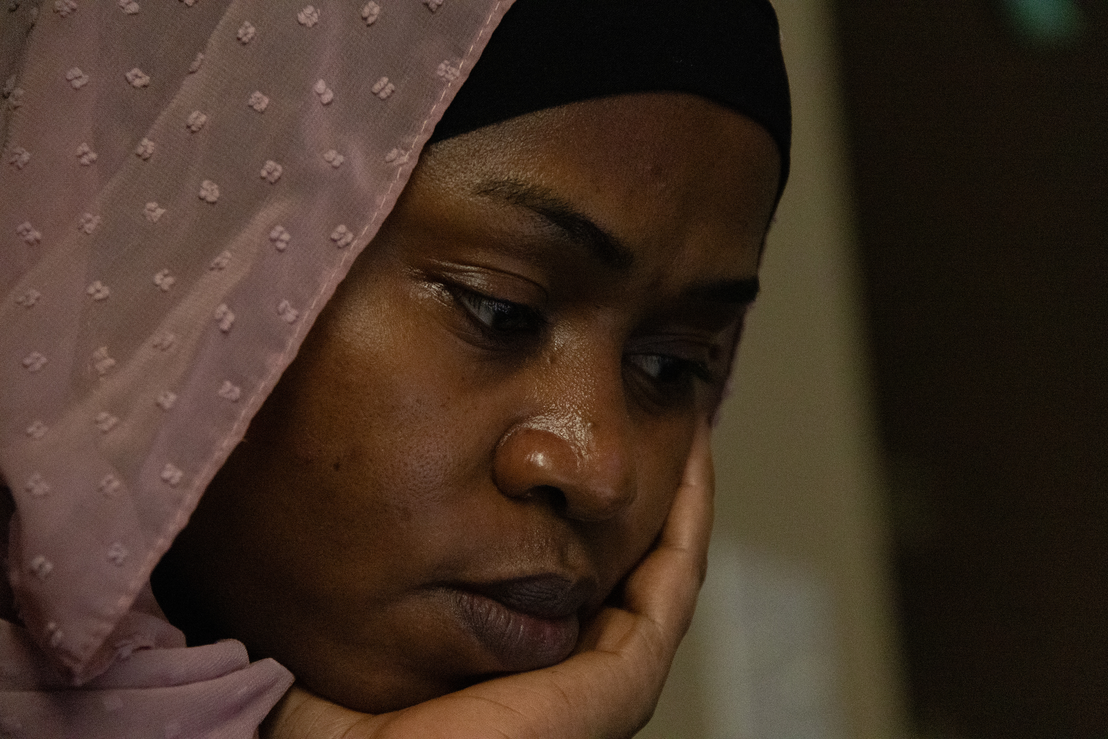 Aisha Ibrahim looks at her laptop to see what assignments she has left for the week on Saturday, Feb. 23, 2025, in Lincoln, Neb. Ibrahim is currently a student at Southeast Community College studying for her associate’s degree in the human services program. She hopes to graduate this May.