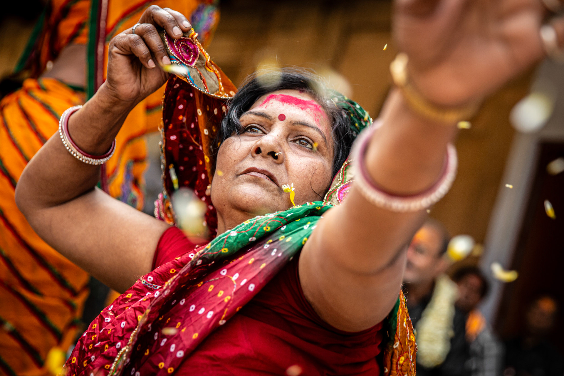 Woman dancing during the Holi festival in a village close to Mathura. Mathura, India