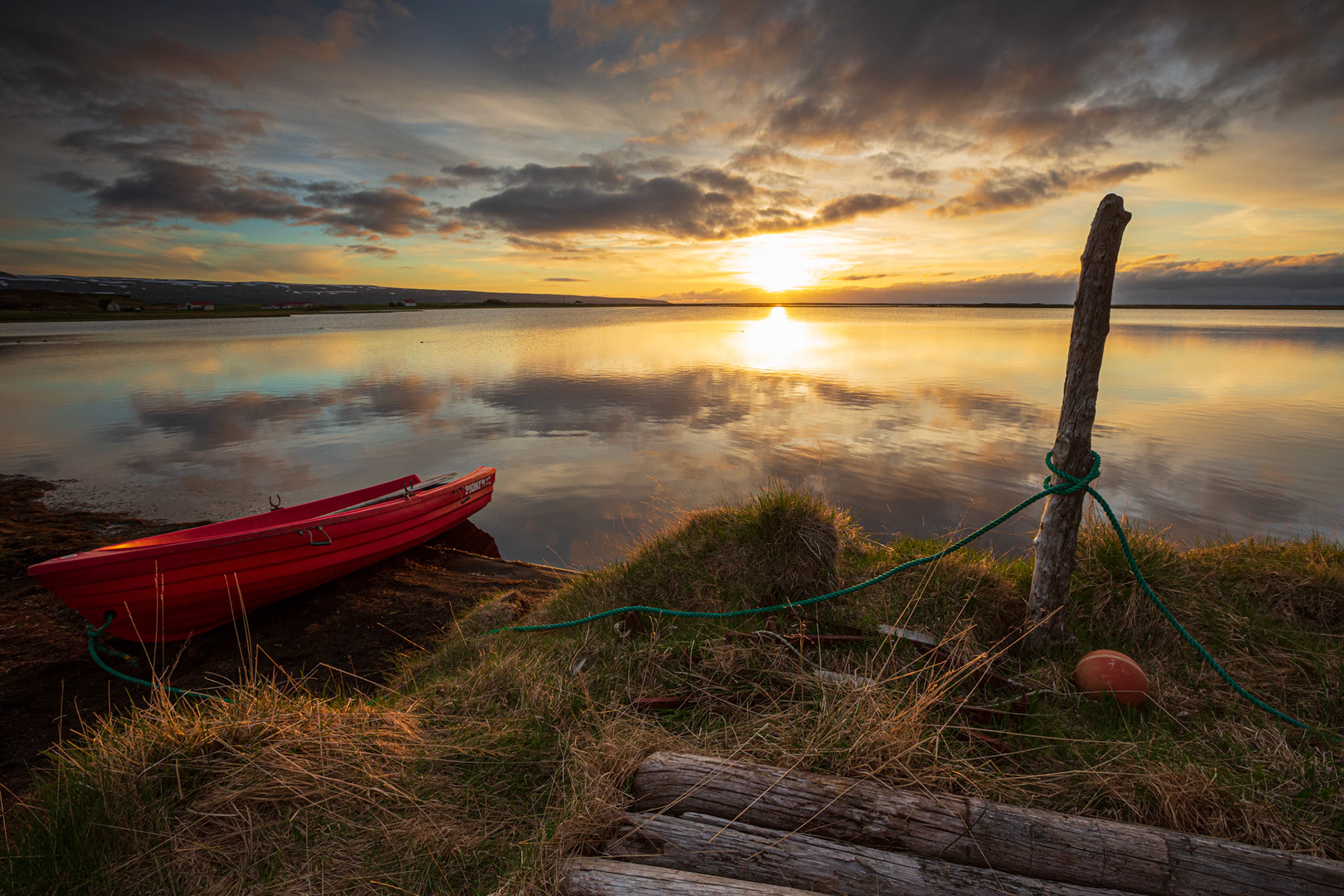 Red boat by the lake. Iceland