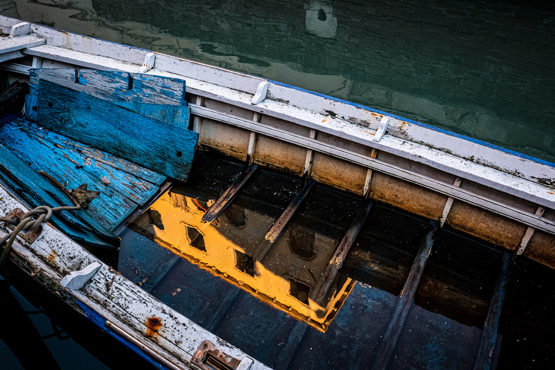 Venice, Portugal - 9 December 2017: Reflection of Venice in a boat