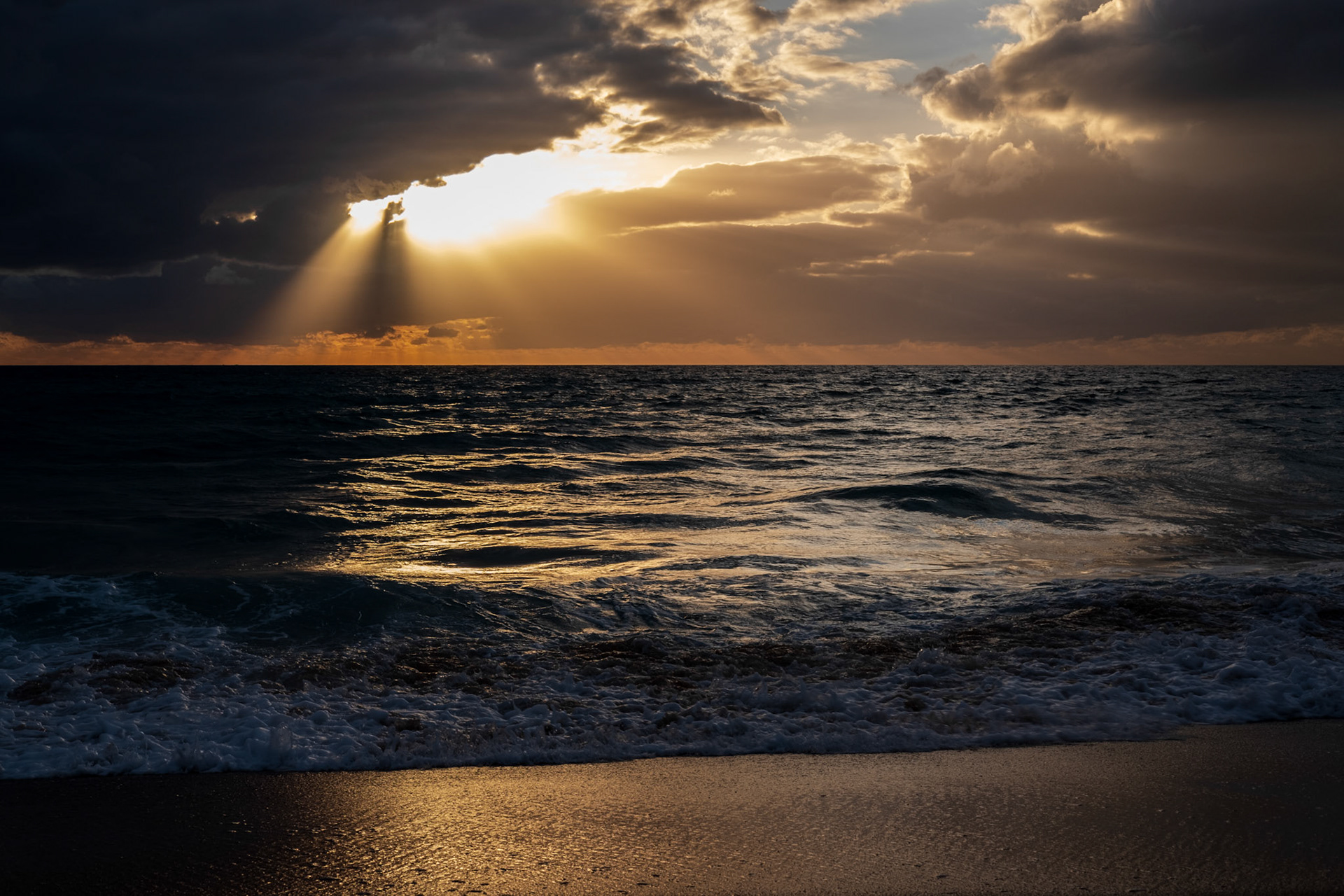 Lourinhã, Portugal - 29 April 2017: Sunset with a heavy sky at Peralta beach