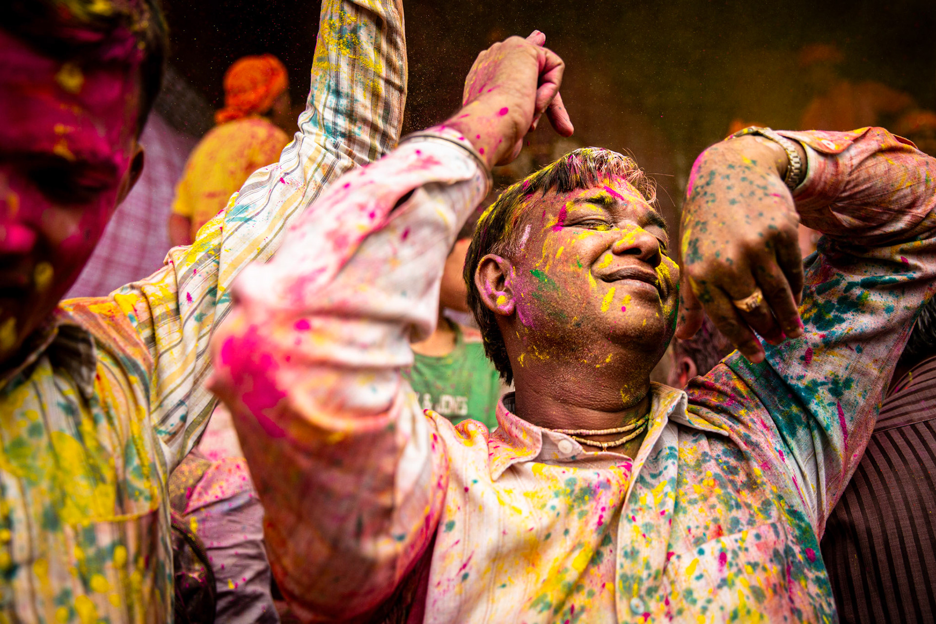 Man dancing during Nandgaon Holi. India