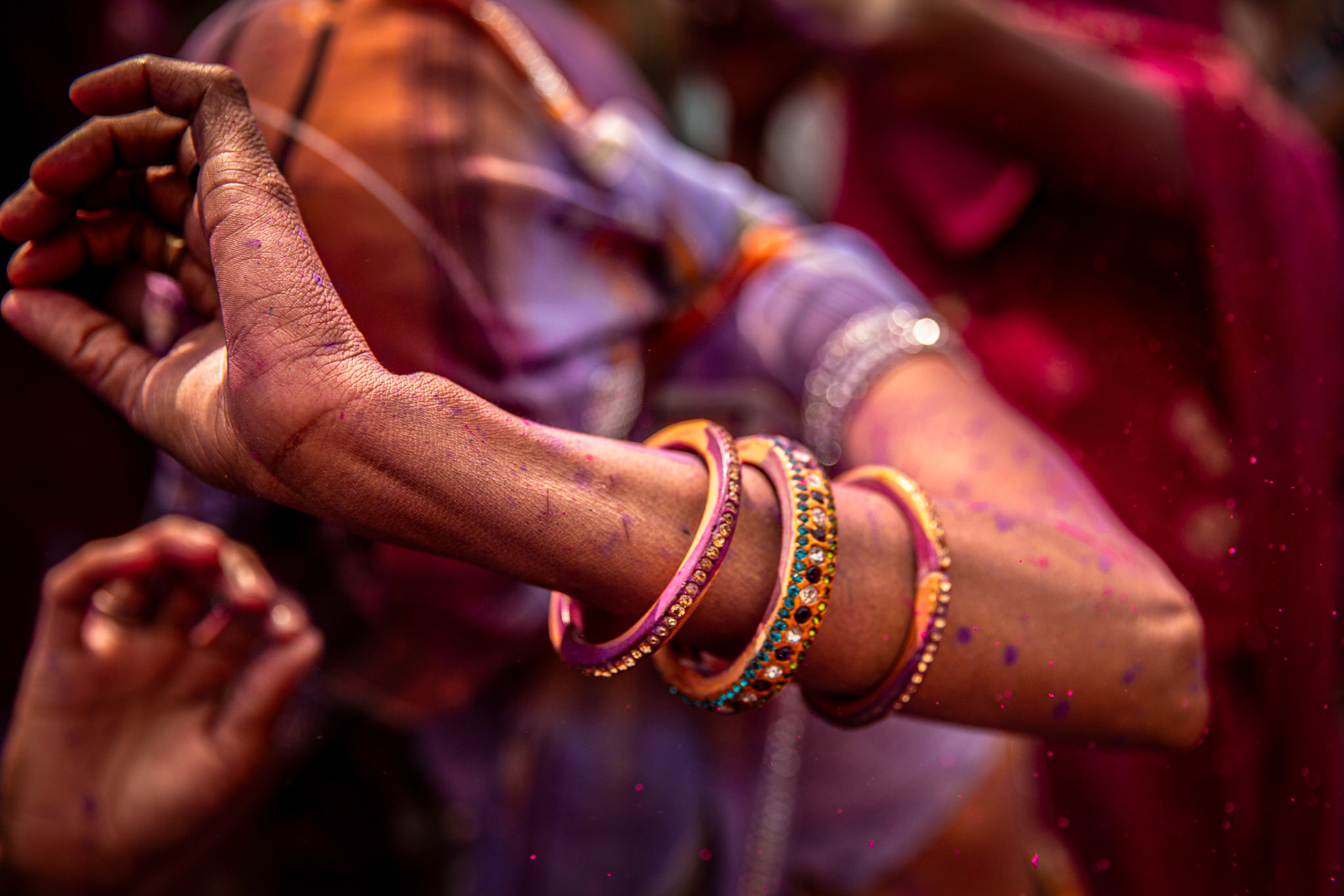 Woman dancing during Nandgaon Holi. India