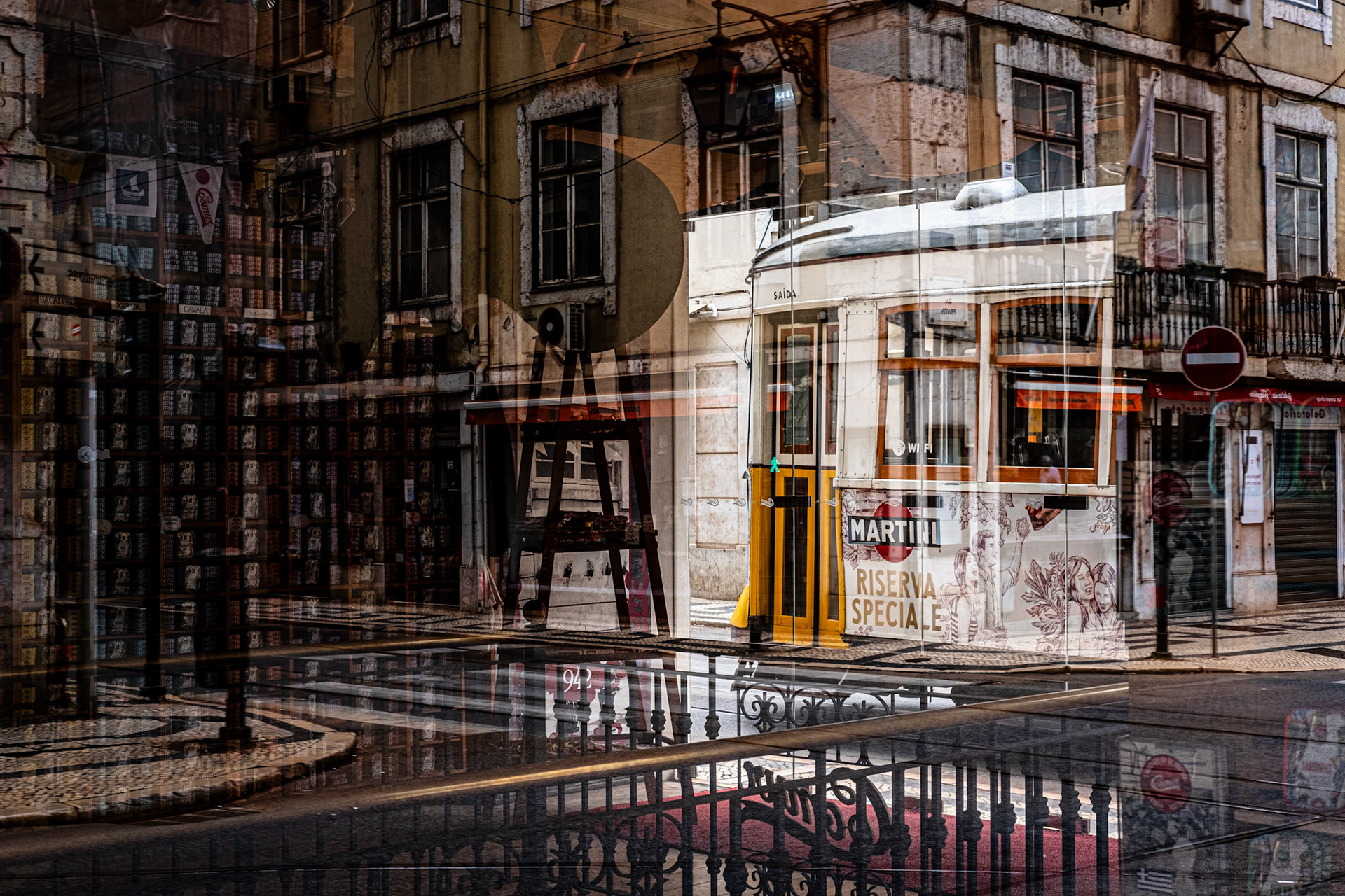 Lisbon, Portugal - 11 June 2020 : Classic tram seen through a window at downtown Lisbon