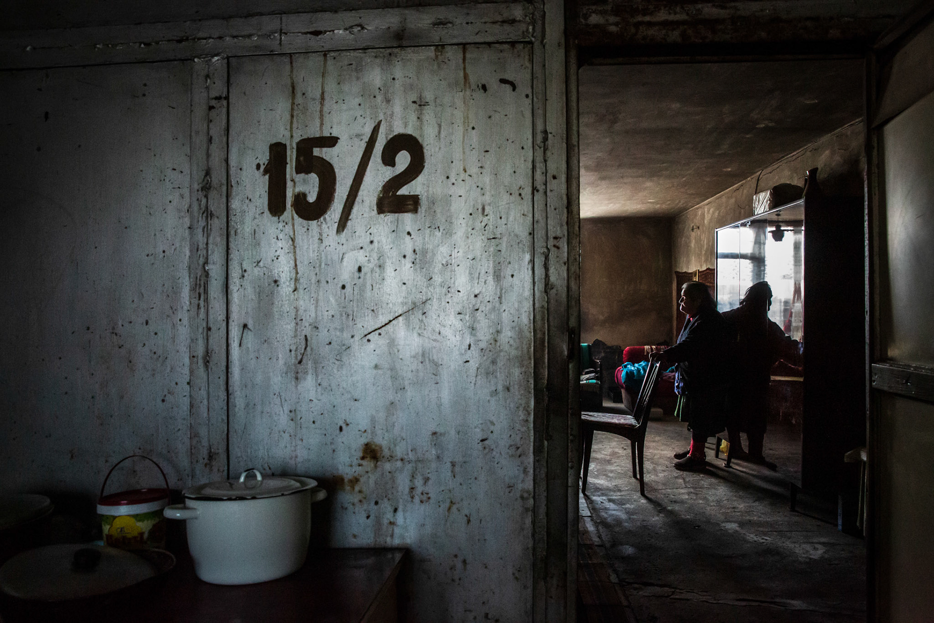 Hasmik in her home, where she lives with her brother Artush. Gyumri, Armenia