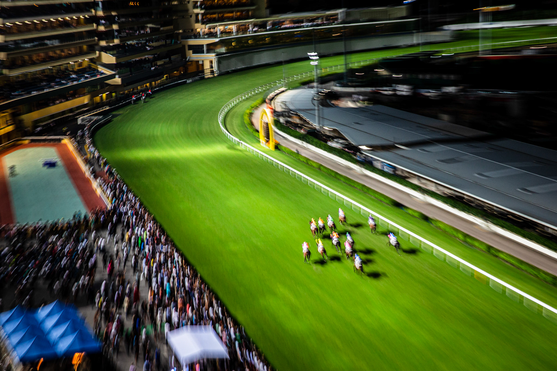 Horse race at Happy Valley racecourse. Hong Kong
