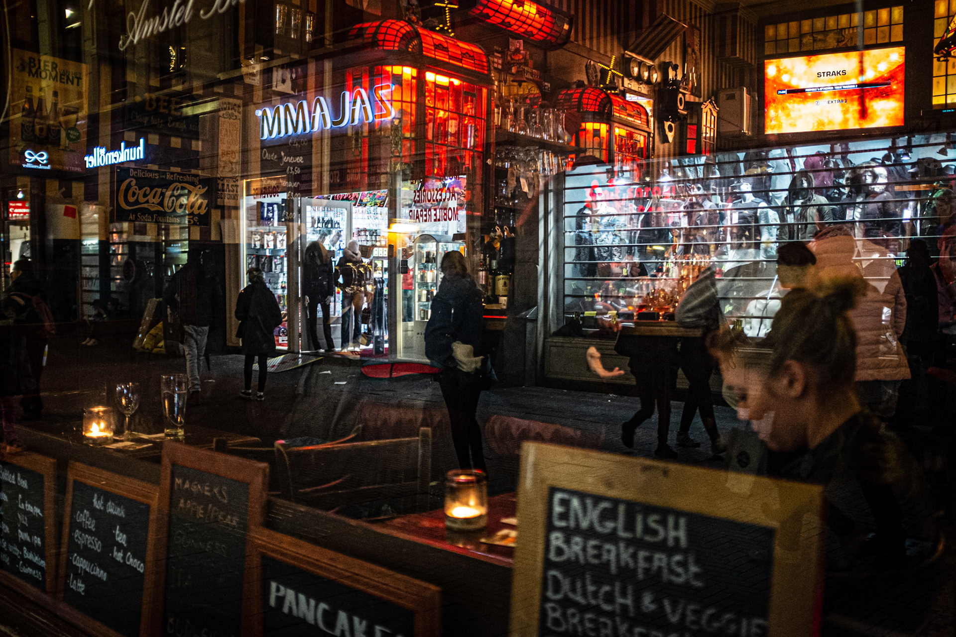 Amsterdam, Netherlands - 28 October 2016: Reflections on a pub window