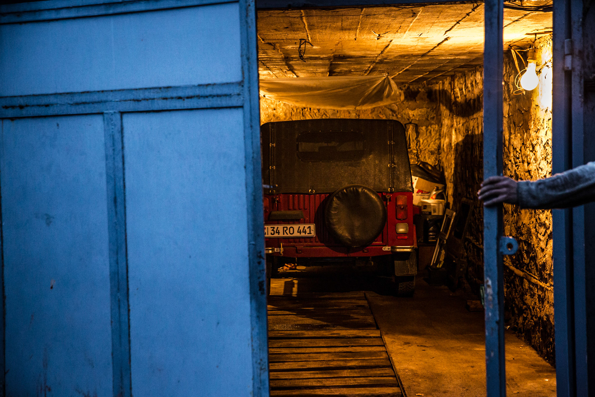 An old modified soviet jeep lies in a garage in Gyumri. Armenia