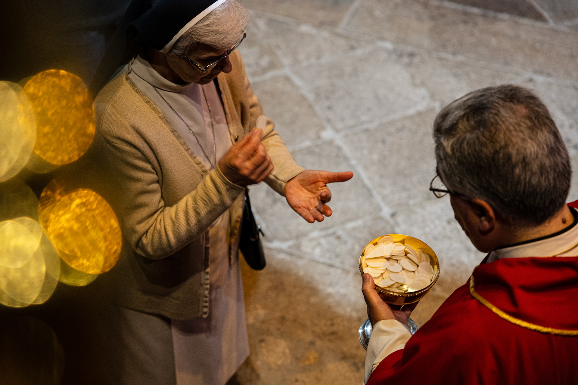 Braga, Portugal - 07 April 2023 : Sacramental bread given during Holy Week celebration