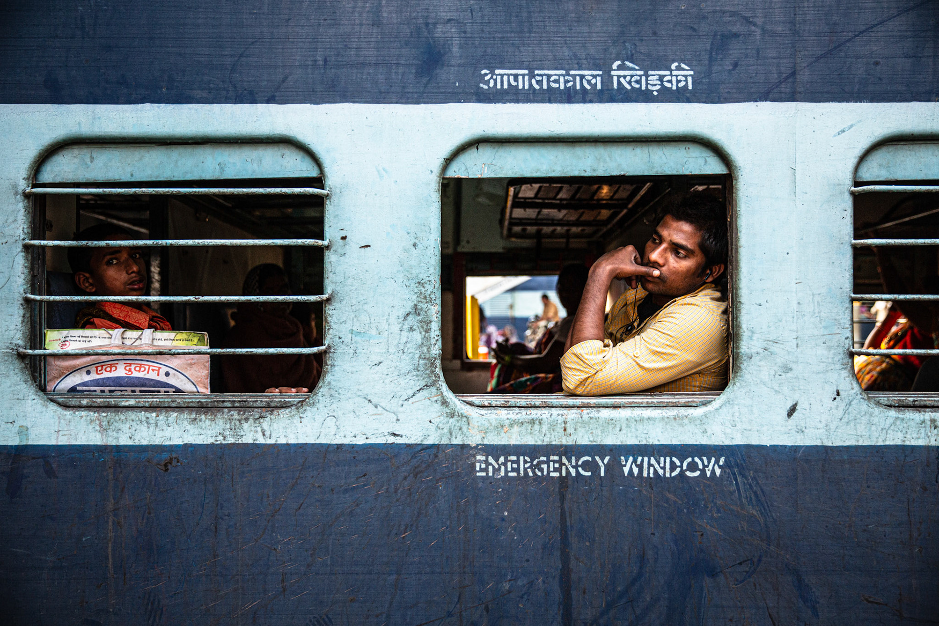 Man by the train window. Varanasi, India