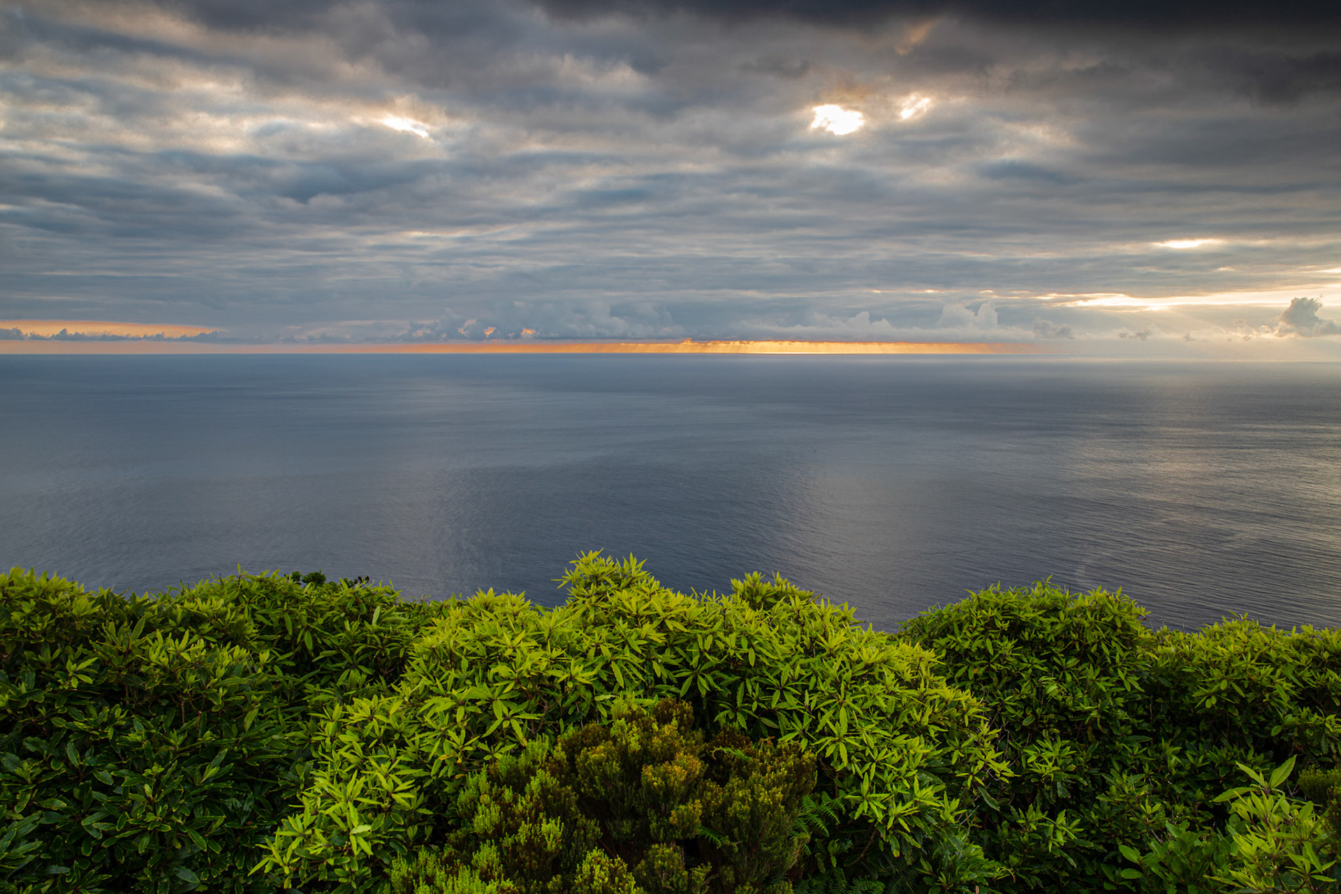 Cloudy sunset over Flores west coast. Azores, Portugal