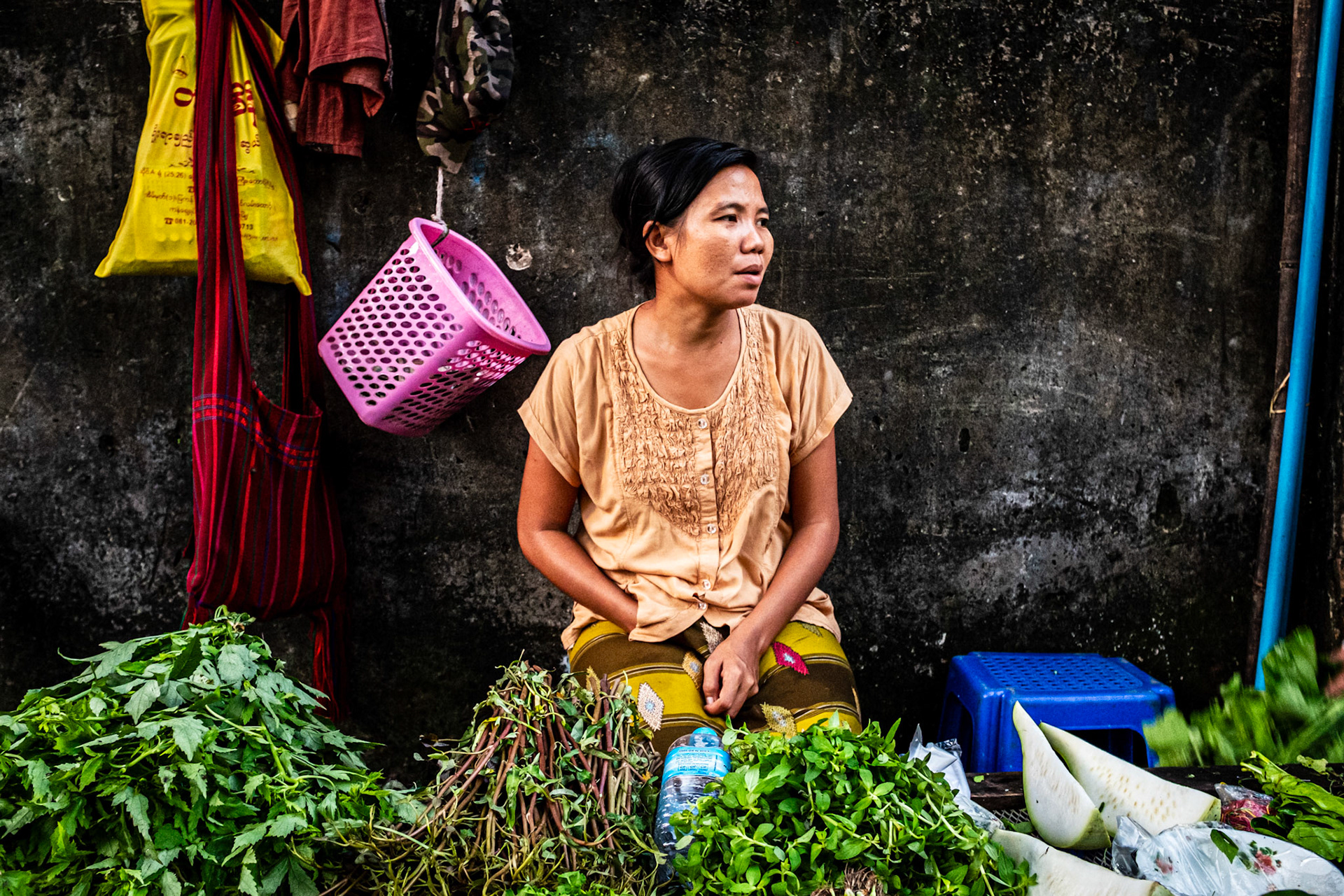 Yangon, Myanmar - 29 September 2016: Selling vegetables on a street market at downtown Yangon