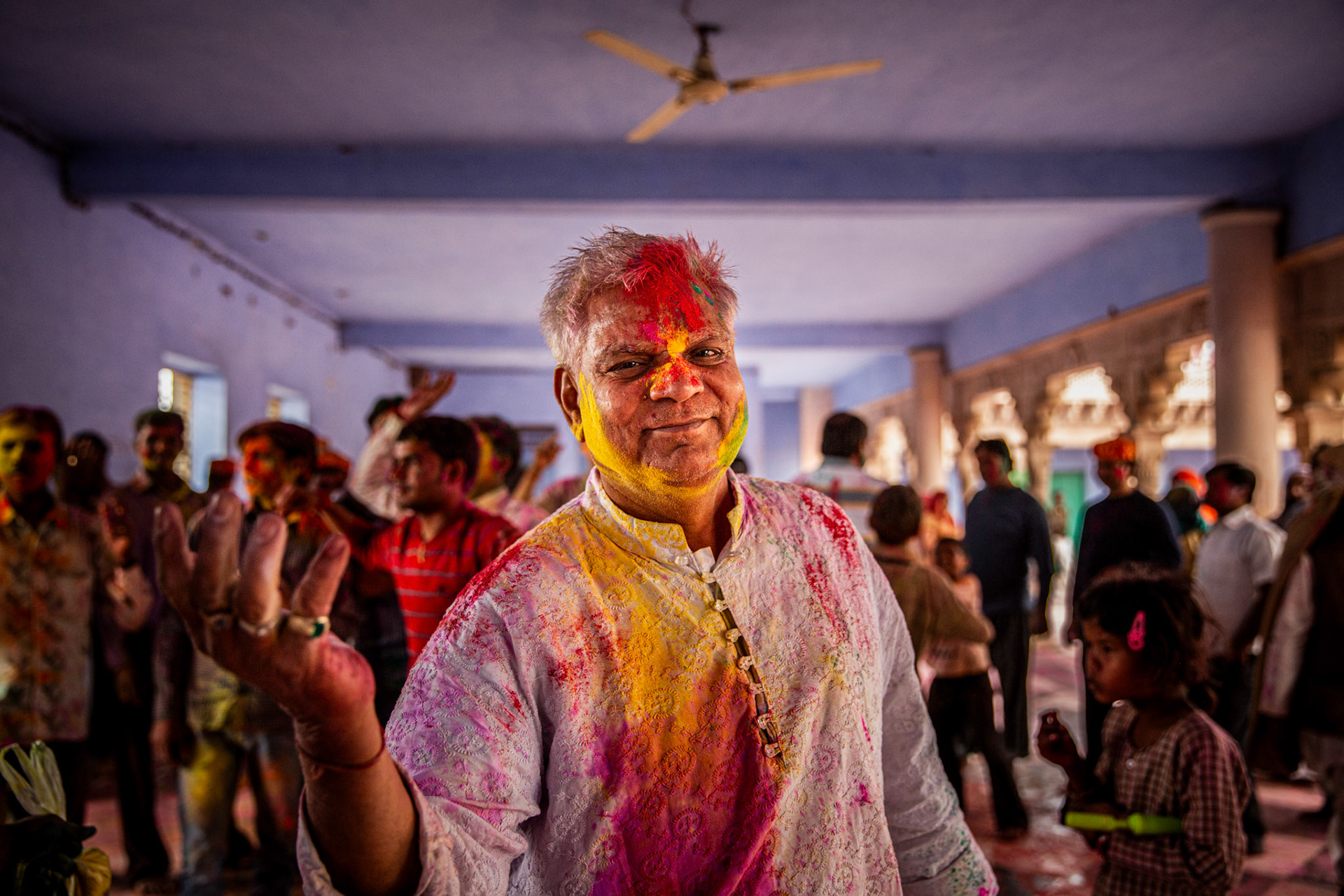 Man dancing during Nandgaon Holi. India