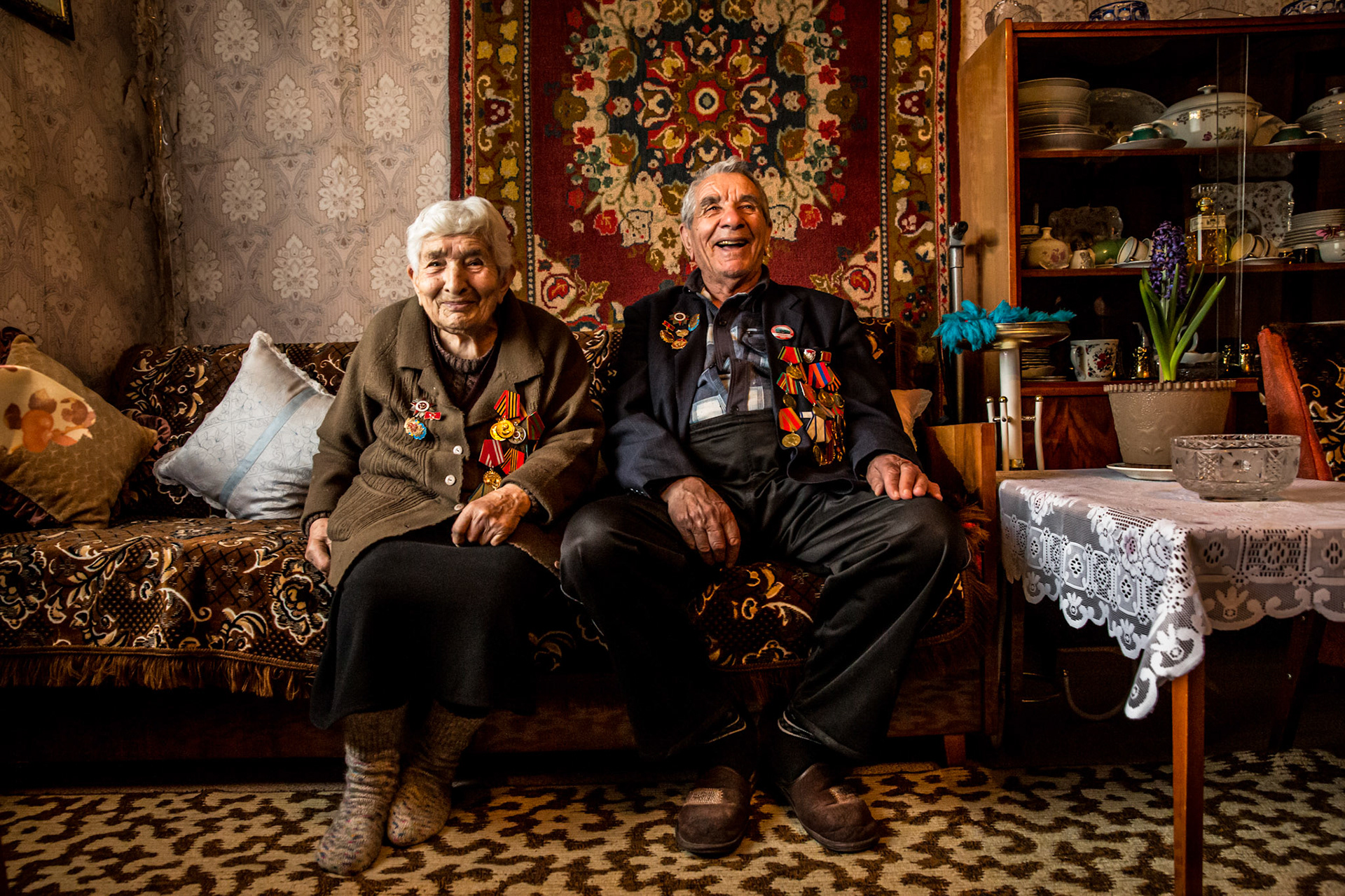 Andre and Vardanush sharing stories from World War II at their home. Gyumri, Armenia