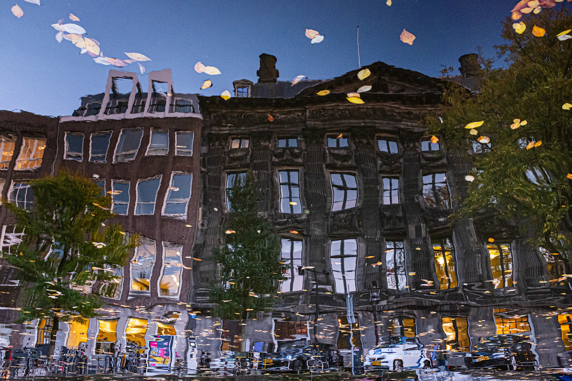 Amsterdam, Netherlands - 30 October 2016: Reflections on an Amsterdam canal