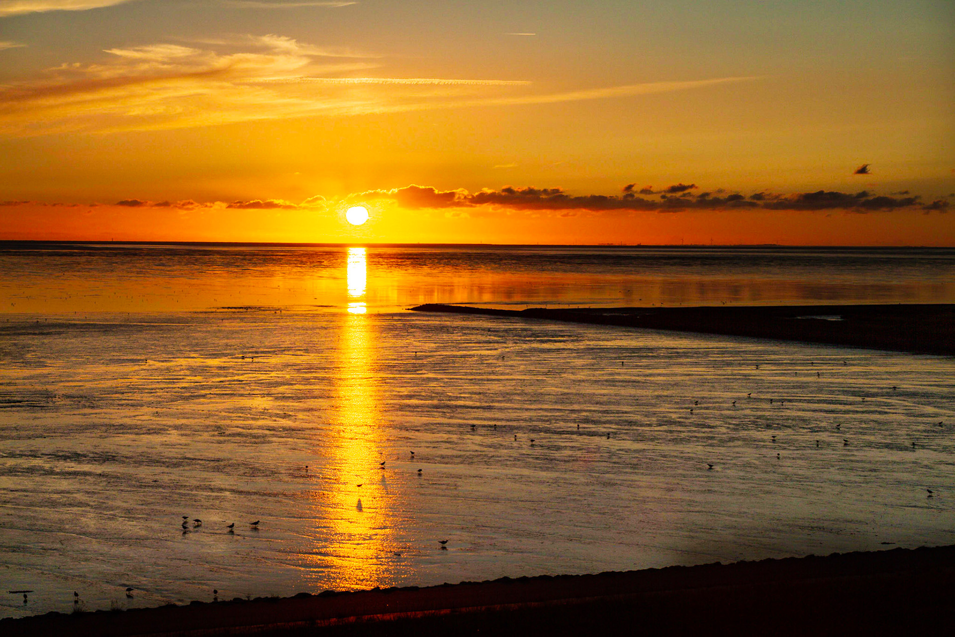 Sonnenunterngang über dem Wattenmeer